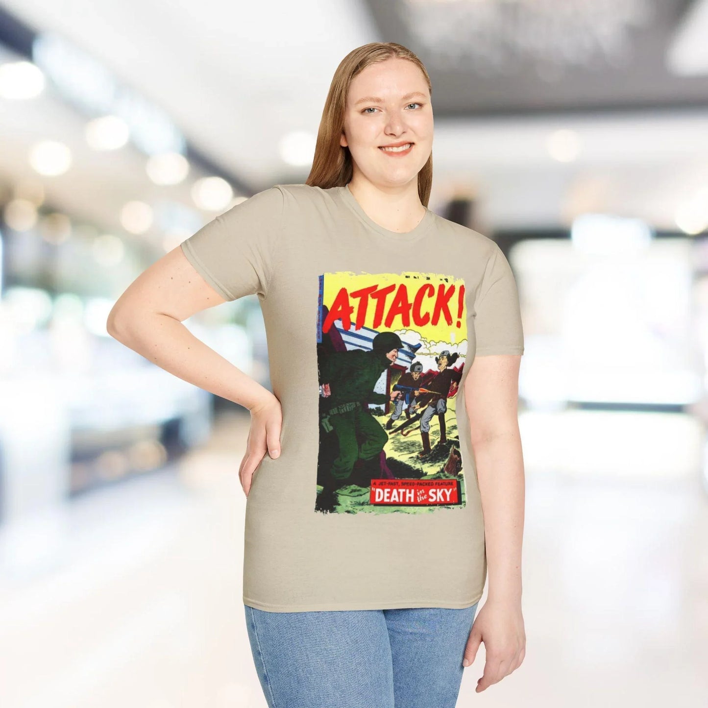 Close-up of the Attack! No. 7 unisex softstyle T-shirt's smooth fabric weave and subtle heathered light blue color at a