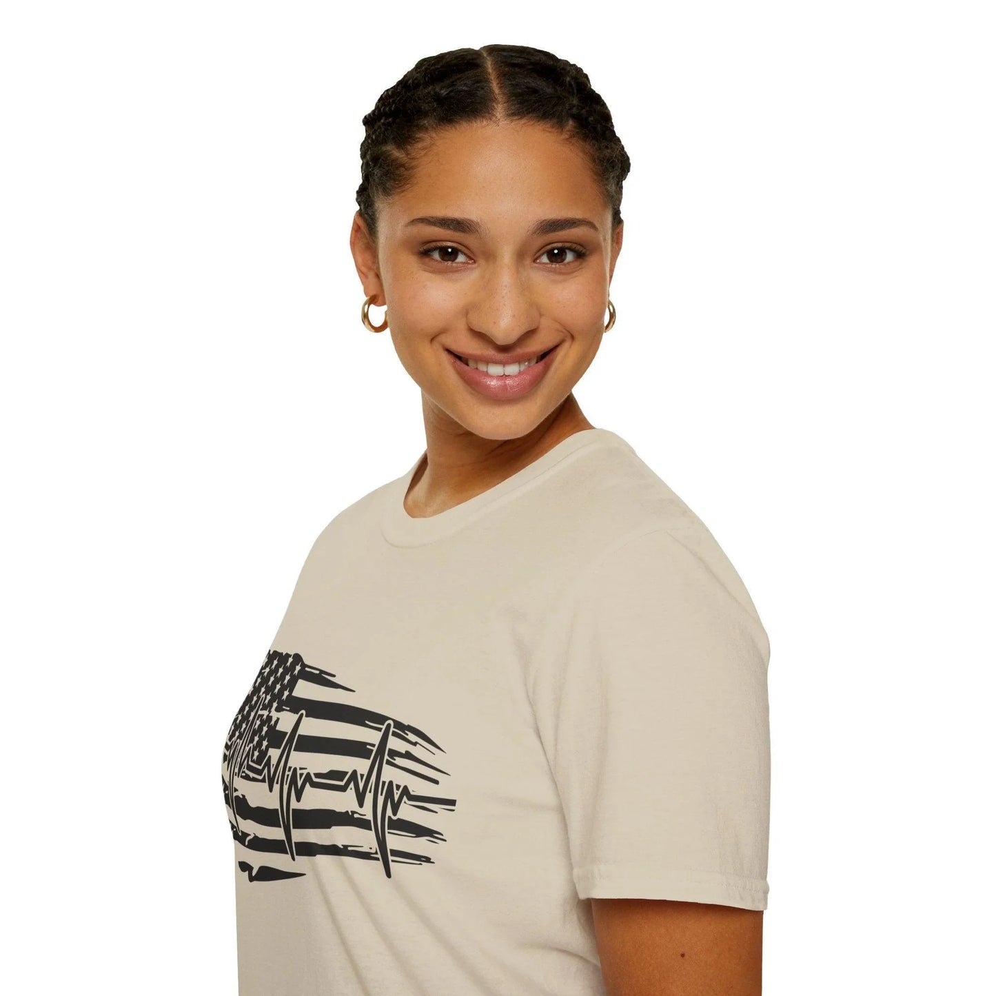 Close-up of black distressed flag heartbeat graphic on soft cotton fabric, highlighting textured print and relaxed fit