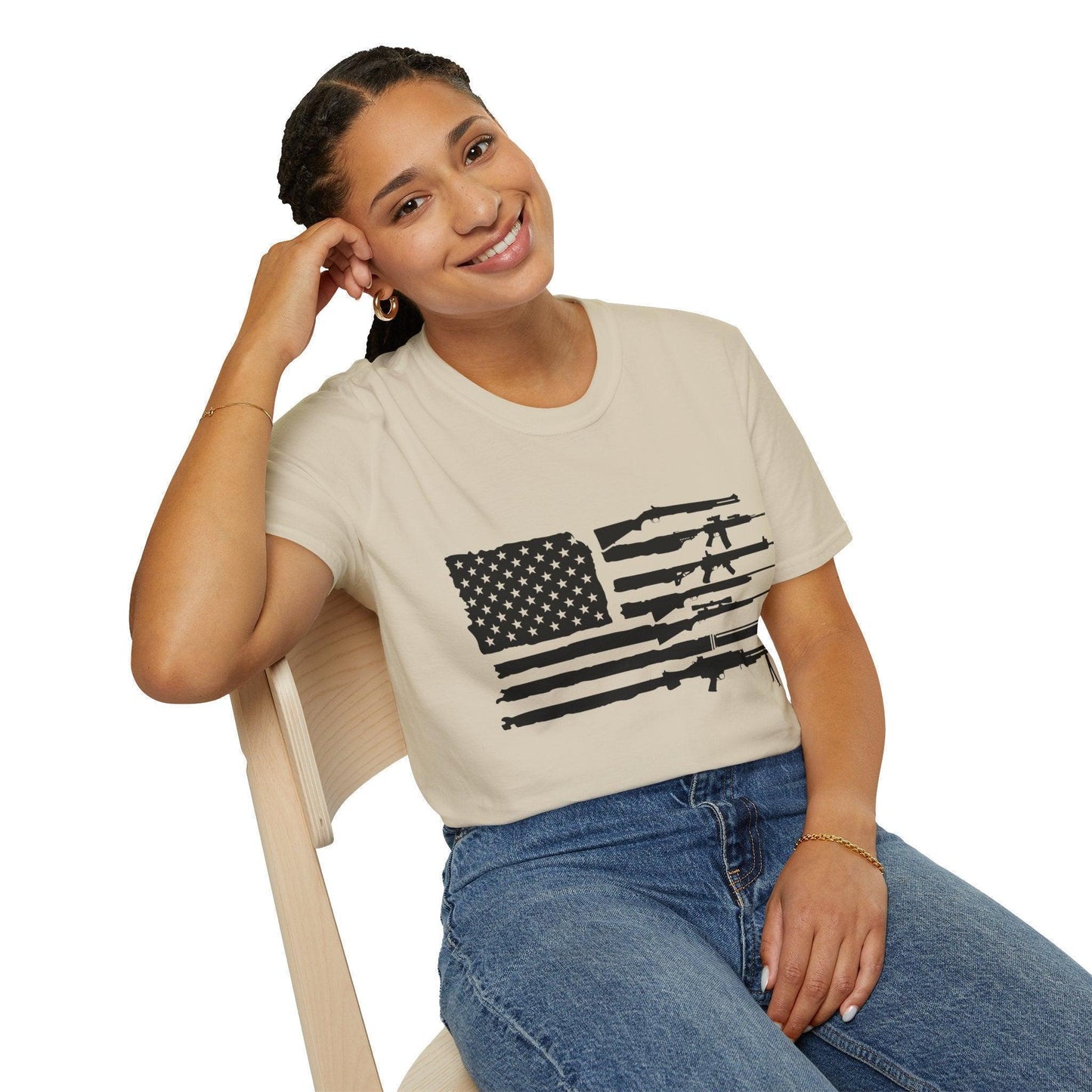 Close-up of black and white American flag guns print on the relaxed-fit, 100% soft cotton crewneck T-shirt’s front chest