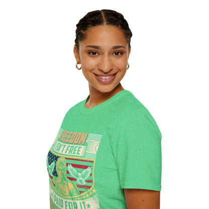 Close-up of the unisex softstyle fabric texture and relaxed fit in navy, highlighting the smooth cotton-blend material from