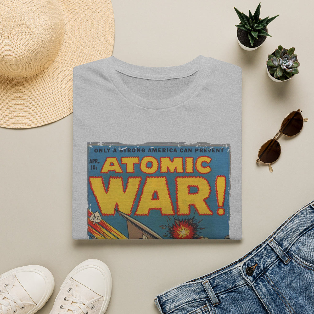 Close-up of the Atomic War! No 4 T-shirt's vibrant red fabric, showing the soft cotton blend and subtle woven texture from a