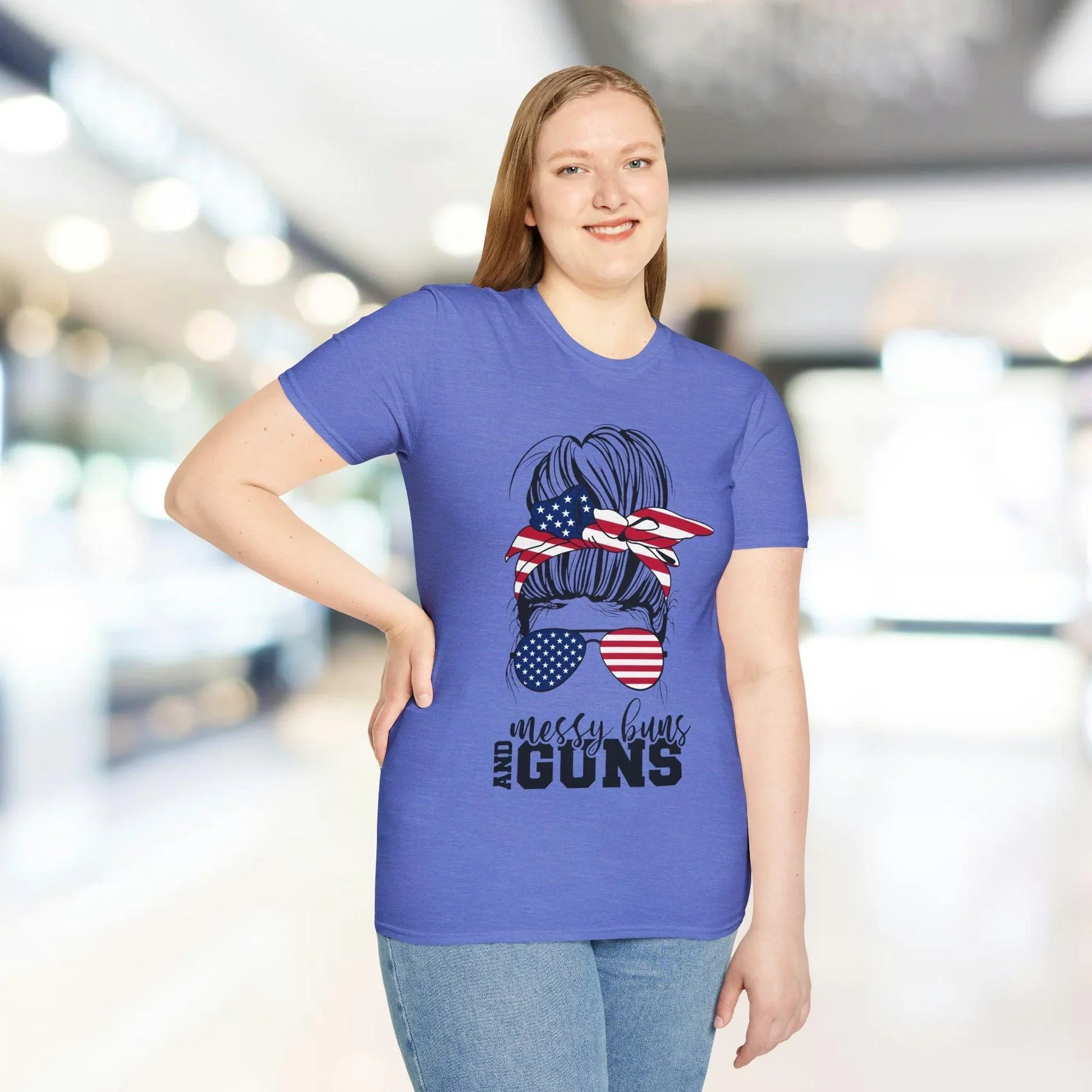 Close-up of the charcoal gray fabric revealing soft cotton texture and subtle heather pattern on the Messy Buns & Guns