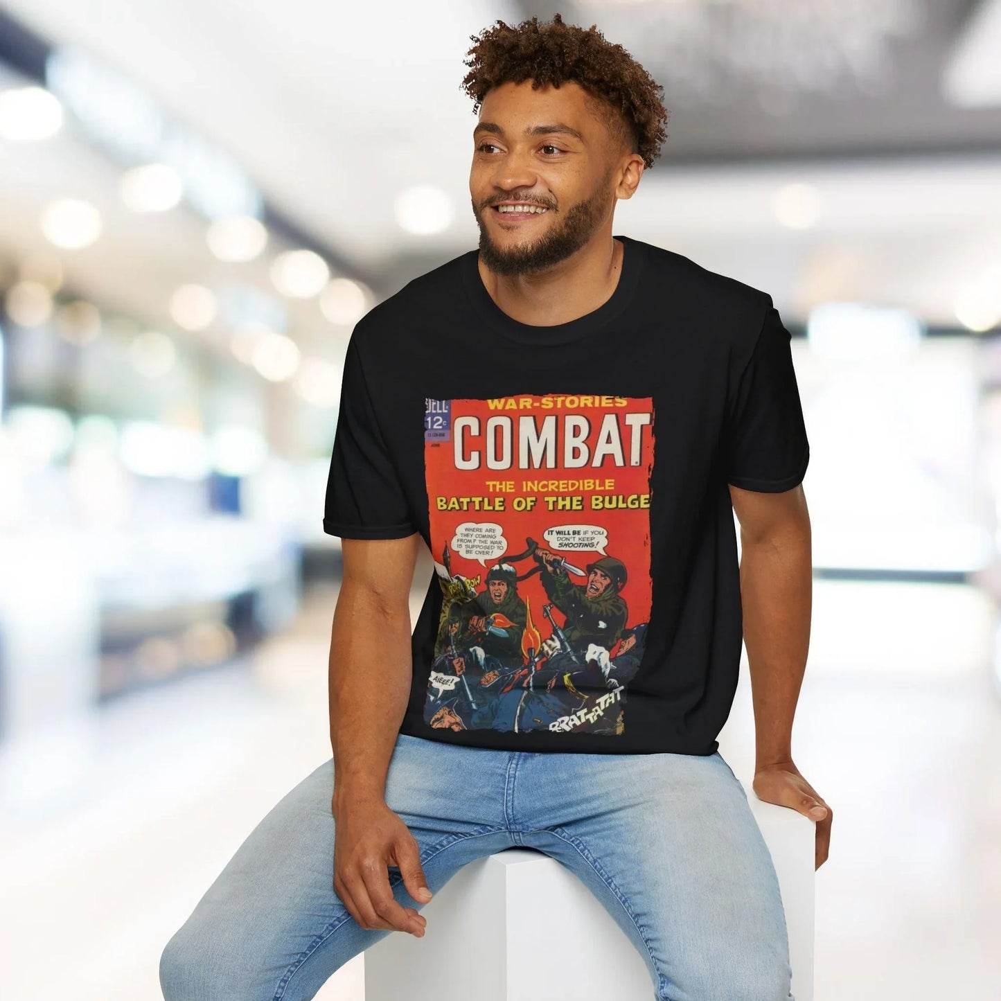 Detail of the Combat June 1966 T-shirt fabric’s subtle heather texture and slim fit silhouette from a high-angle perspective