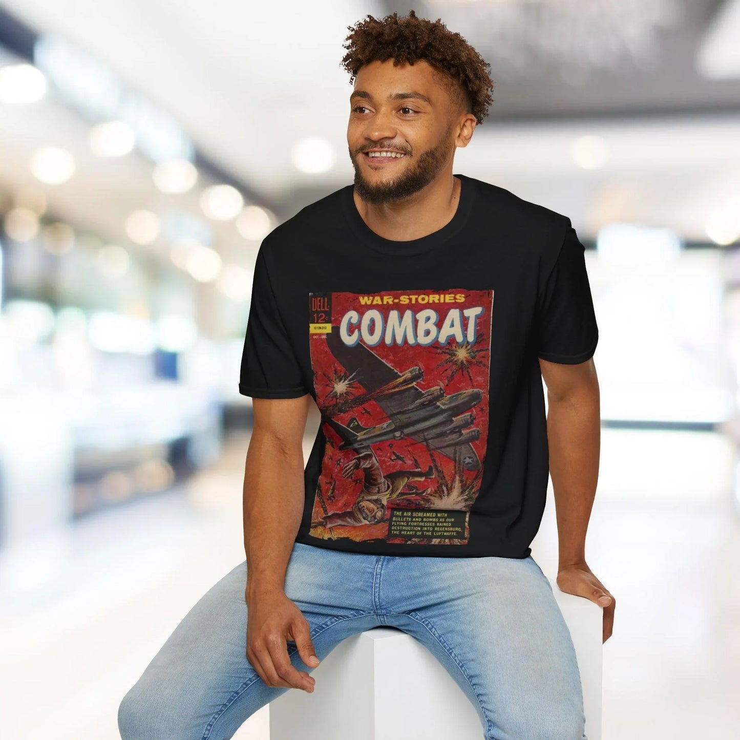 Close-up of the Combat Dec 1962 T-shirt’s fabric weave and vibrant olive drab color from a front angle illuminating the