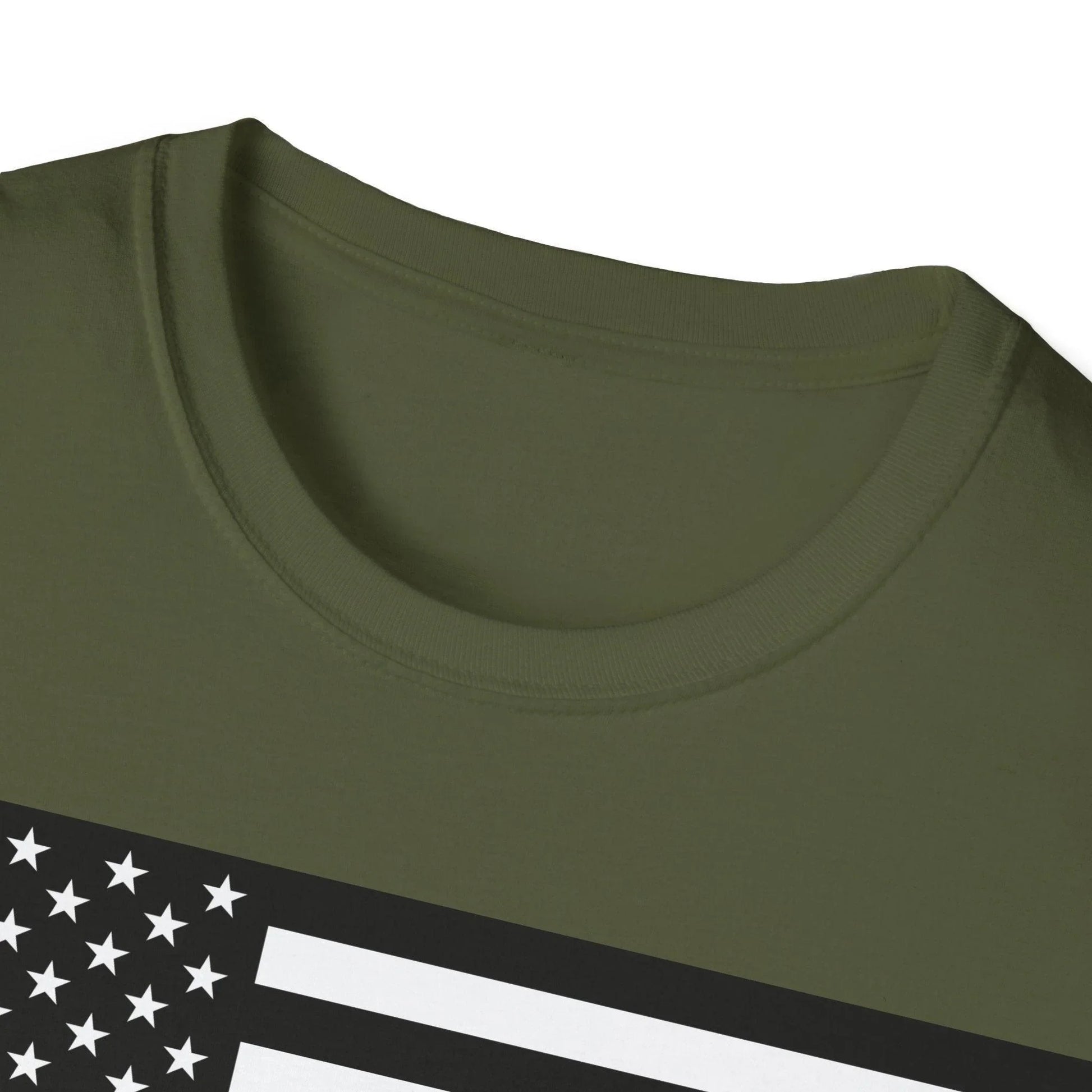 Black and white American flag heartbeat graphic on the front chest area of the unisex softstyle T-shirt shown from a