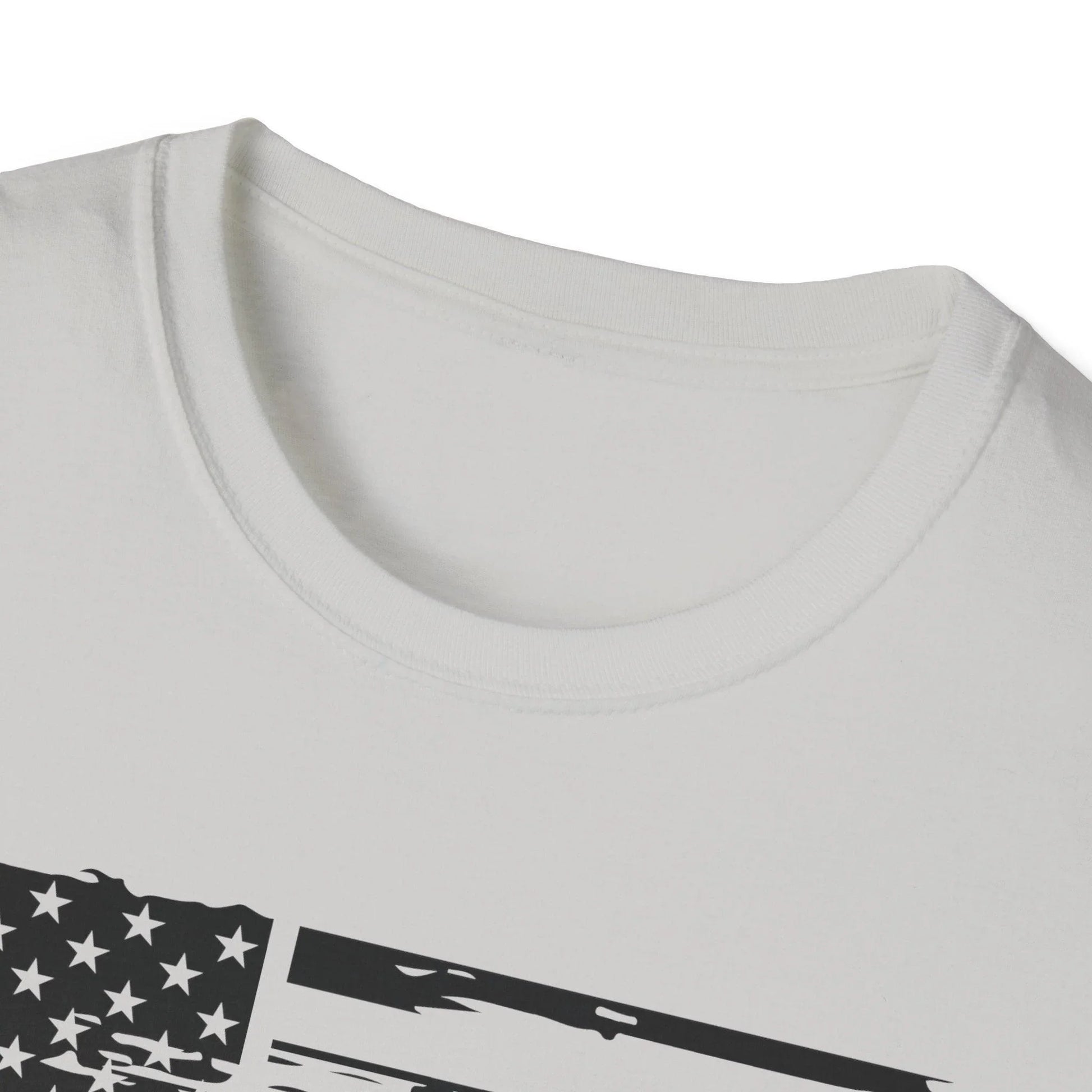 Close-up of the distressed black-and-white American flag graphic on the chest area of the unisex softstyle T-shirt with