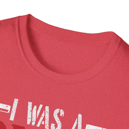 Close-up of soft, heather gray fabric with stitched neckline and subtle textured weave detail at the shoulder seam.