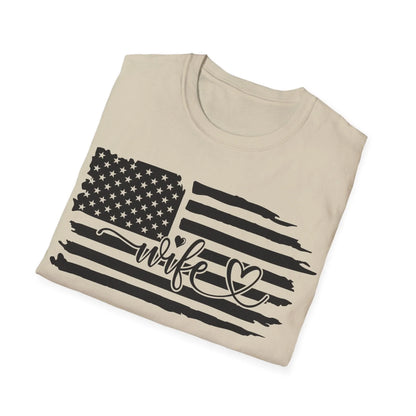 Close-up of distressed black and white American flag graphic on the chest of the unisex softstyle T-shirt, highlighting the