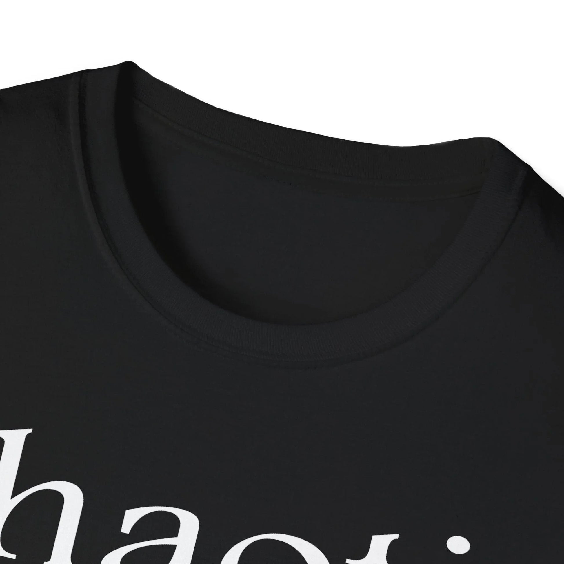 Close-up of the white cotton fabric showing smooth texture and subtle stitching detail along the neckline seam.