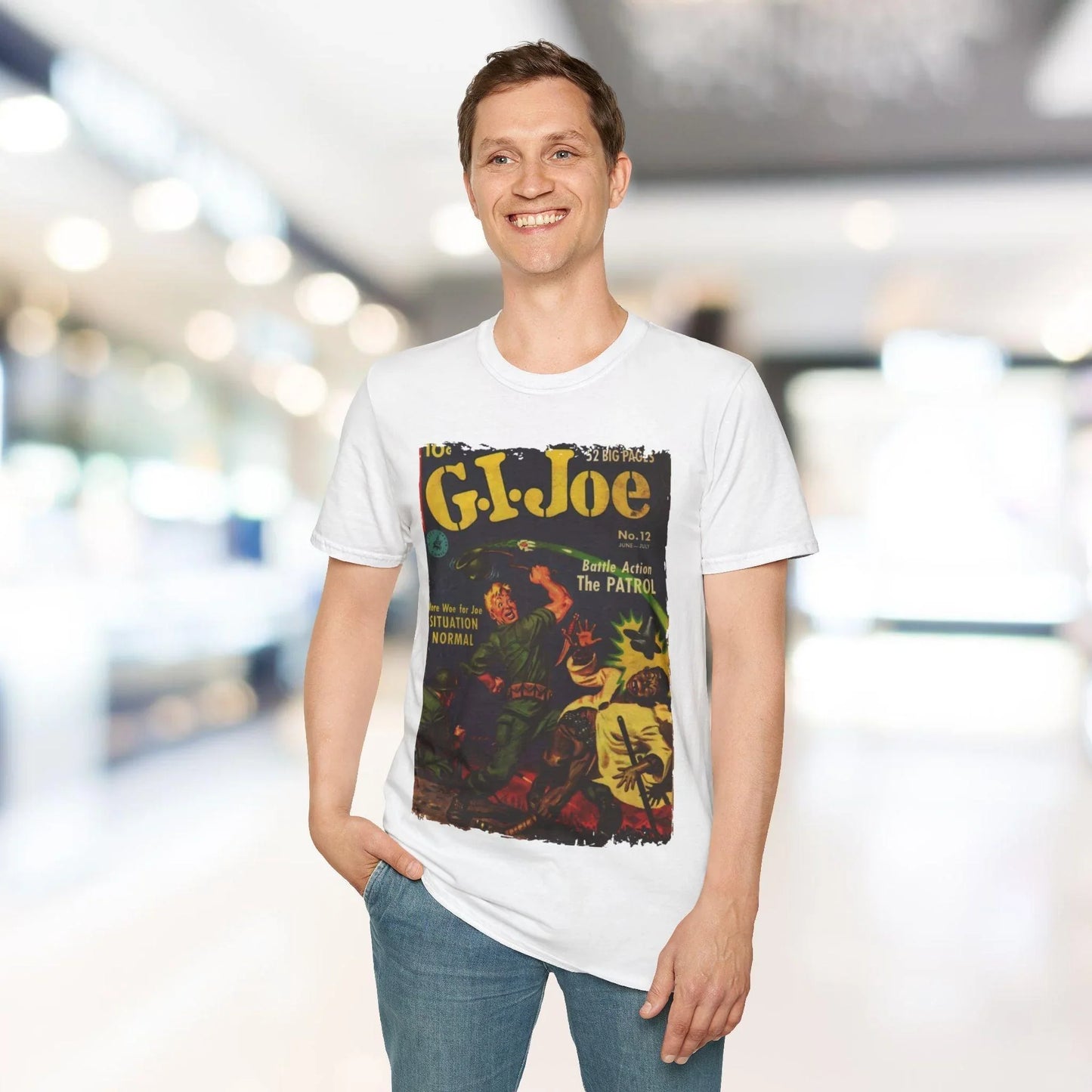 Close-up of the G.I. Joe No.12 unisex softstyle T-shirt label sewn onto the chest area, showcasing the fabric’s smooth