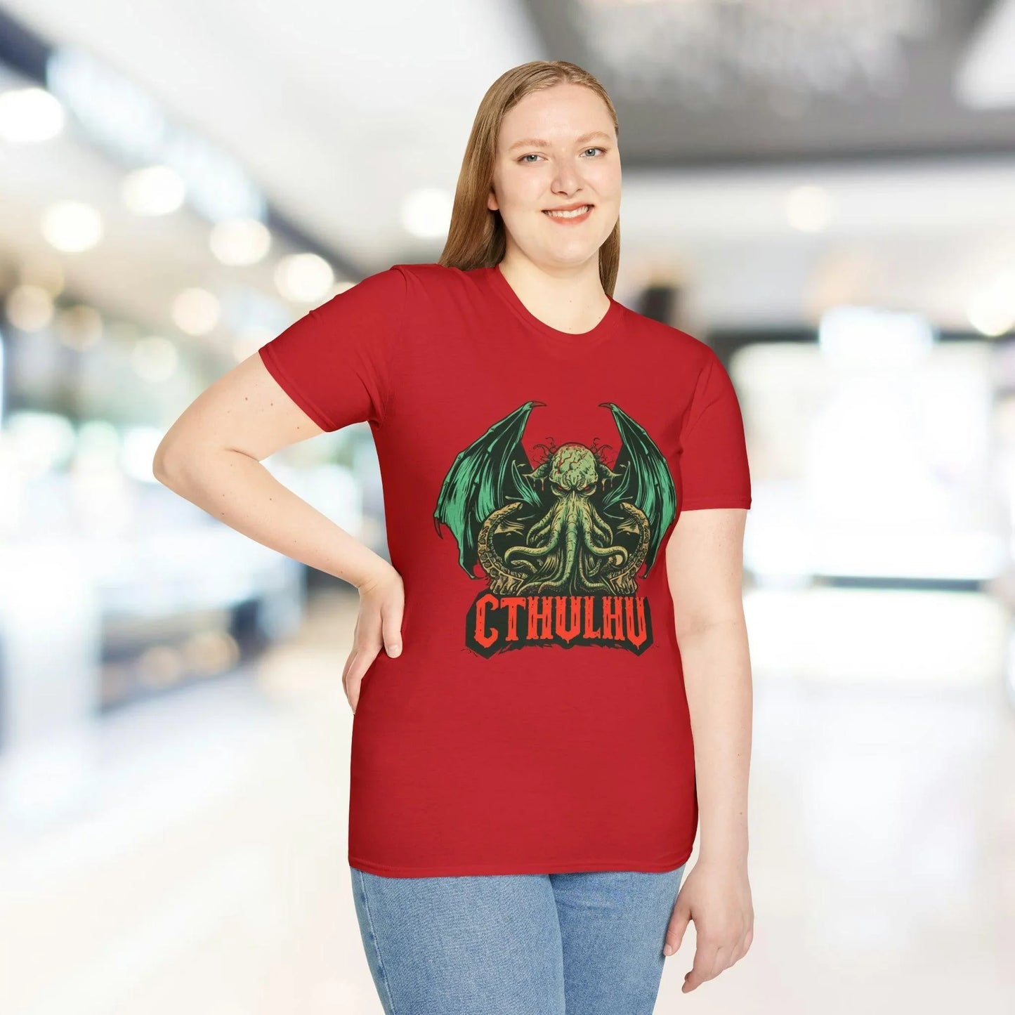 Close-up of the Cthulhu-themed graphic detail on the relaxed-fit slate gray cotton T-shirt’s front neckline.