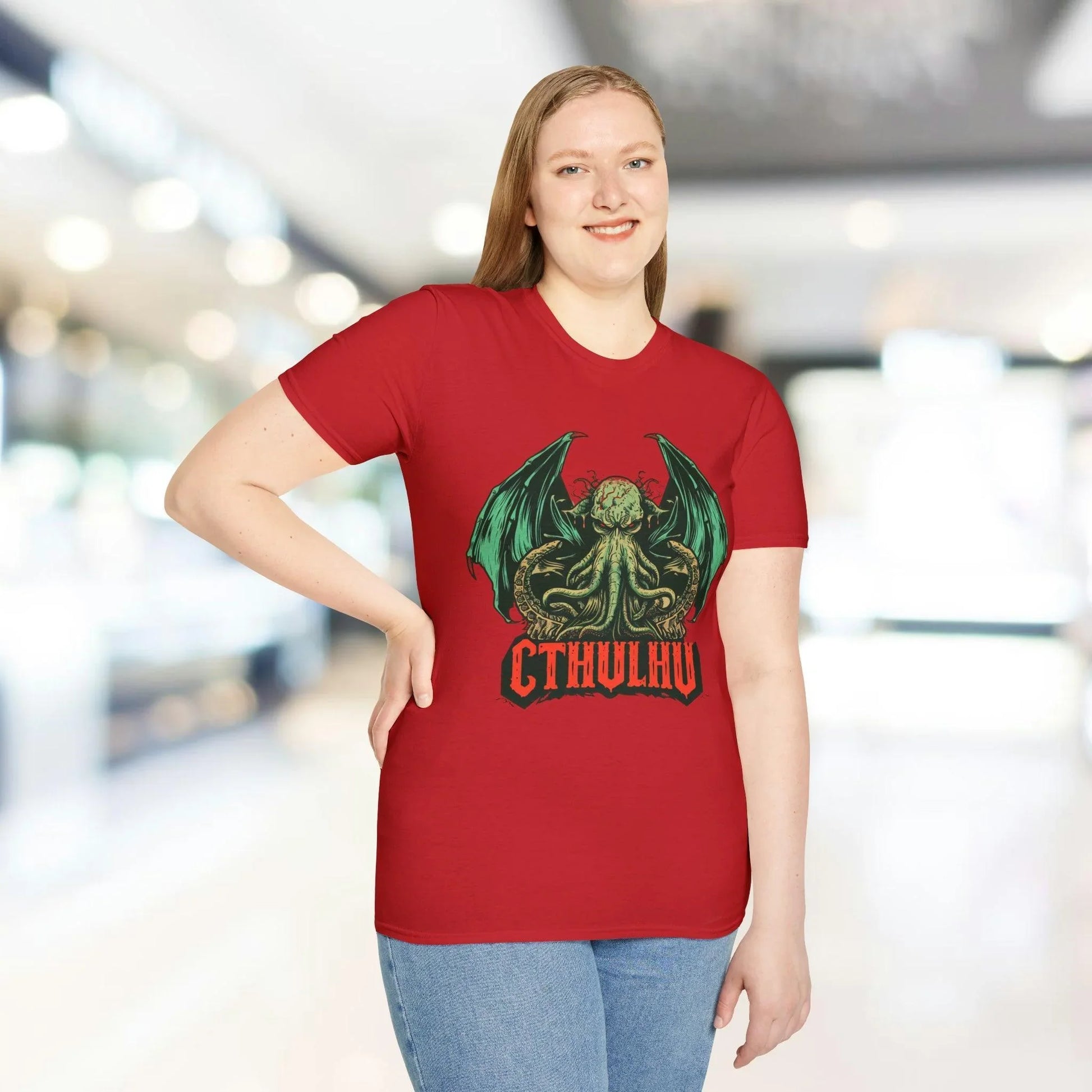 Close-up of the Cthulhu-themed graphic detail on the relaxed-fit slate gray cotton T-shirt’s front neckline.