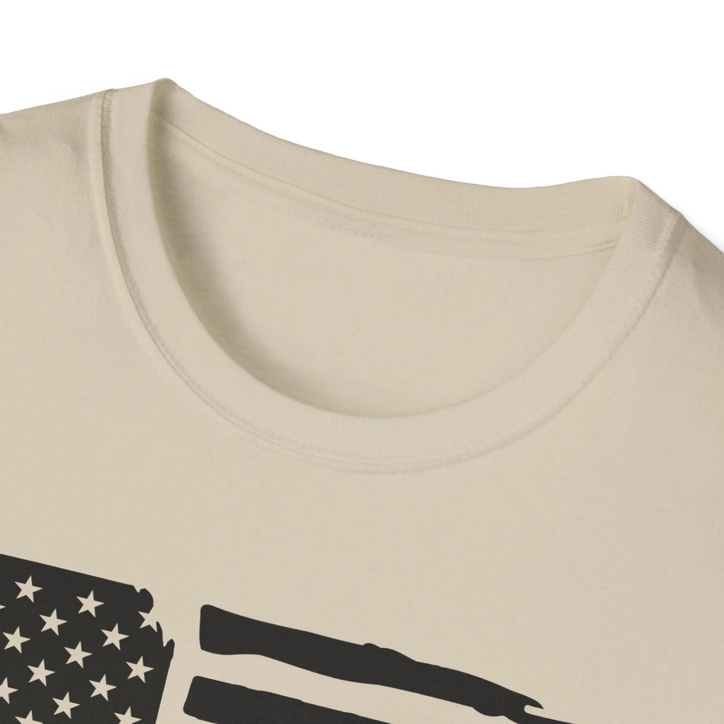 Close-up of distressed black and white American flag graphic on fabric showing worn texture and faded details on the