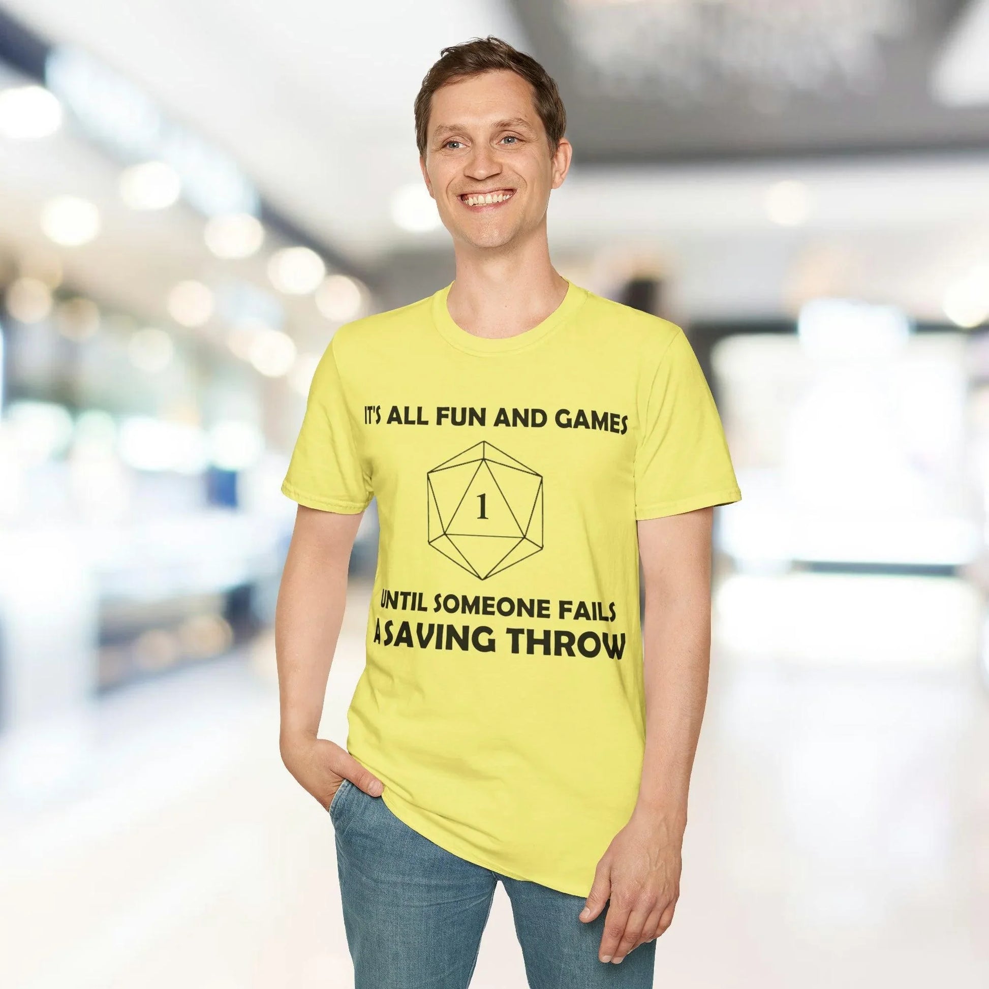 Close-up of the Black All Fun and Games T-Shirt label showing fabric composition and size tag on relaxed-fit sleeve edge