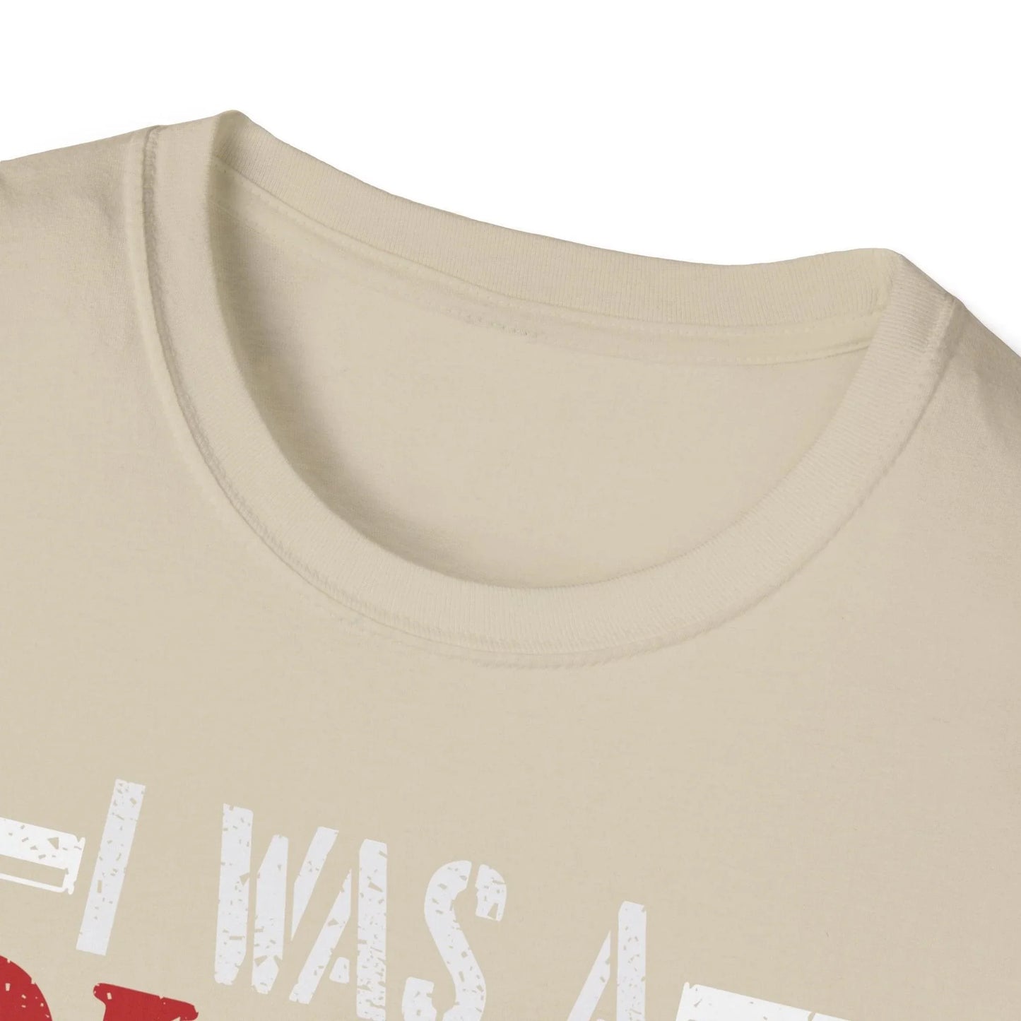 Close-up of the unisex softstyle T-shirt’s collar and shoulder seam in rich black fabric showcasing smooth stitching and