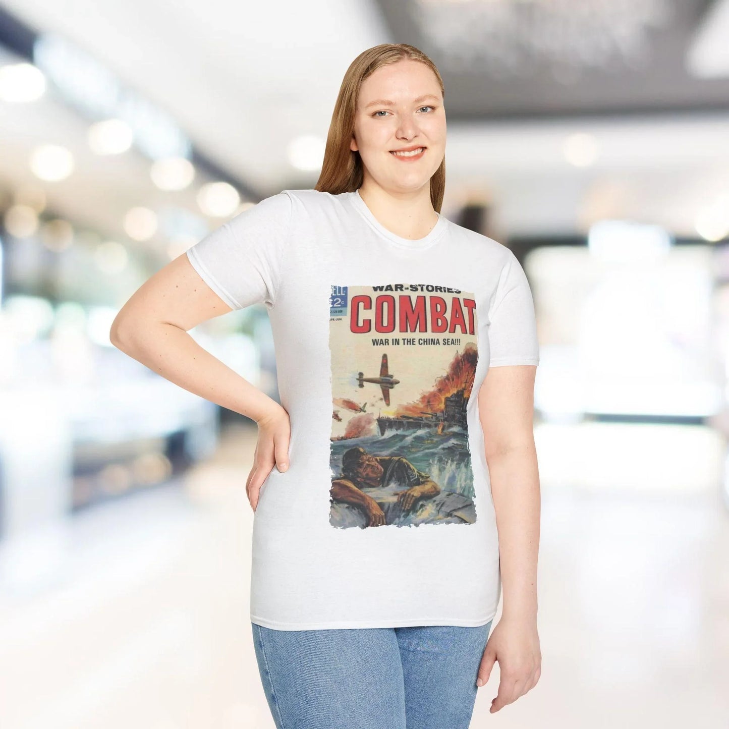 Close-up of the Combat April 1965 T-shirt's woven neck tag on black fabric, highlighting the soft cotton blend and subtle