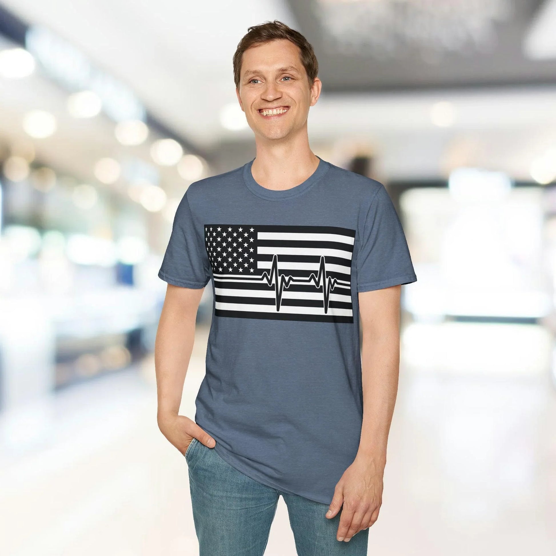 Close-up of the unisex black fabric with American flag heartbeat design printed across the chest area, highlighting the