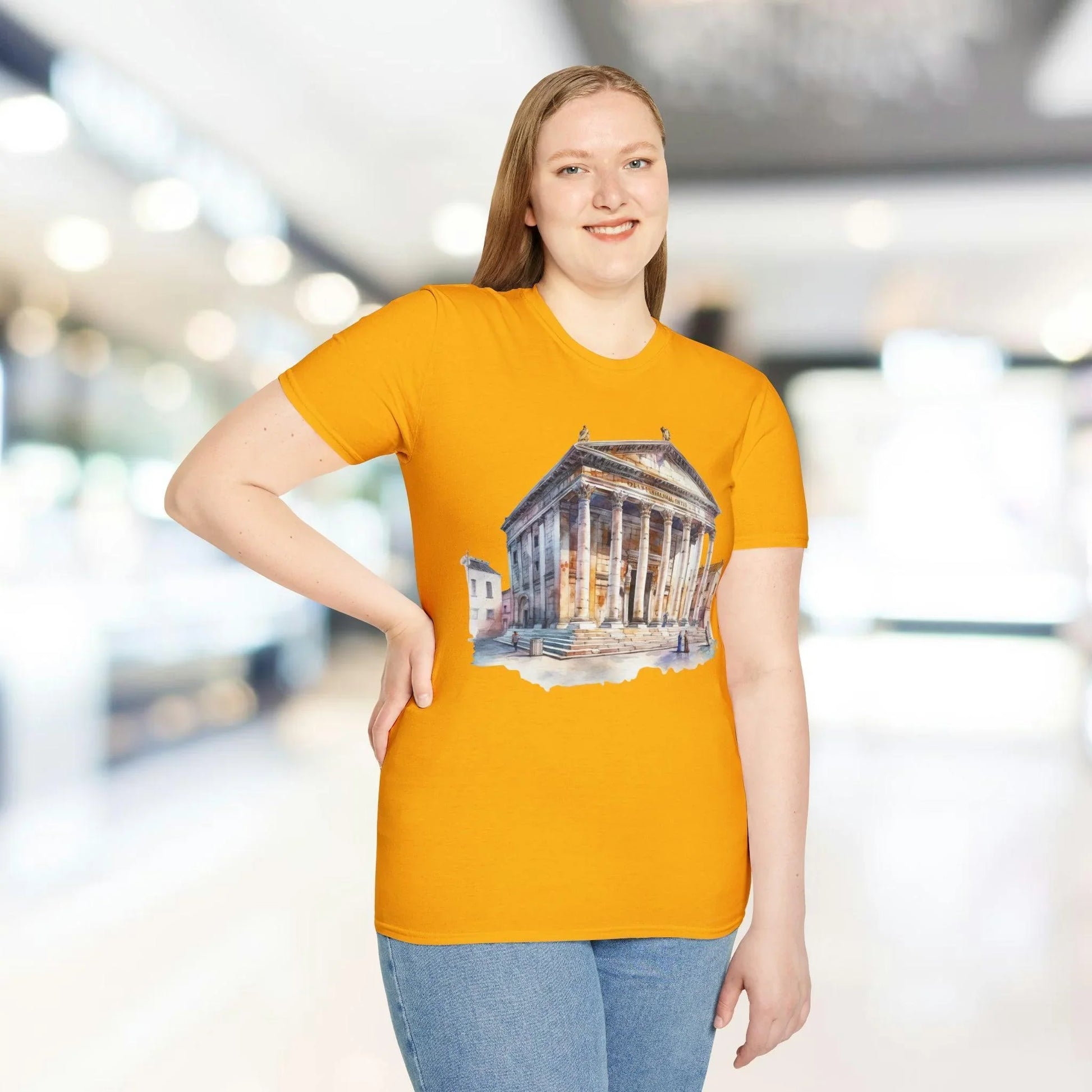 Close-up of the unisex softstyle fabric showing subtle heather texture and relaxed fit neckline from a front-left angle.