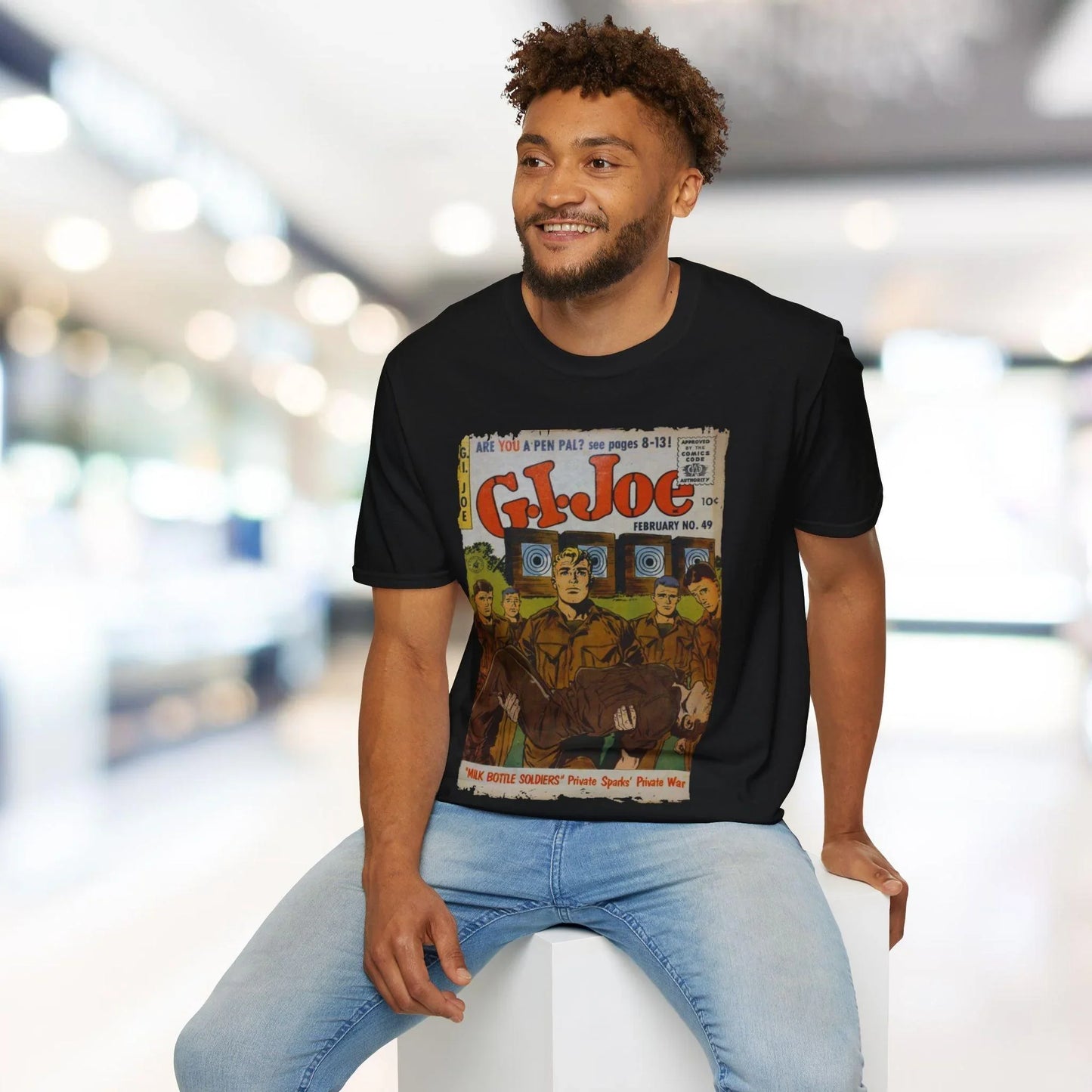 Close-up of the G.I. Joe No.49 unisex softstyle T-shirt's collar stitching and smooth fabric edge from a top-down angle