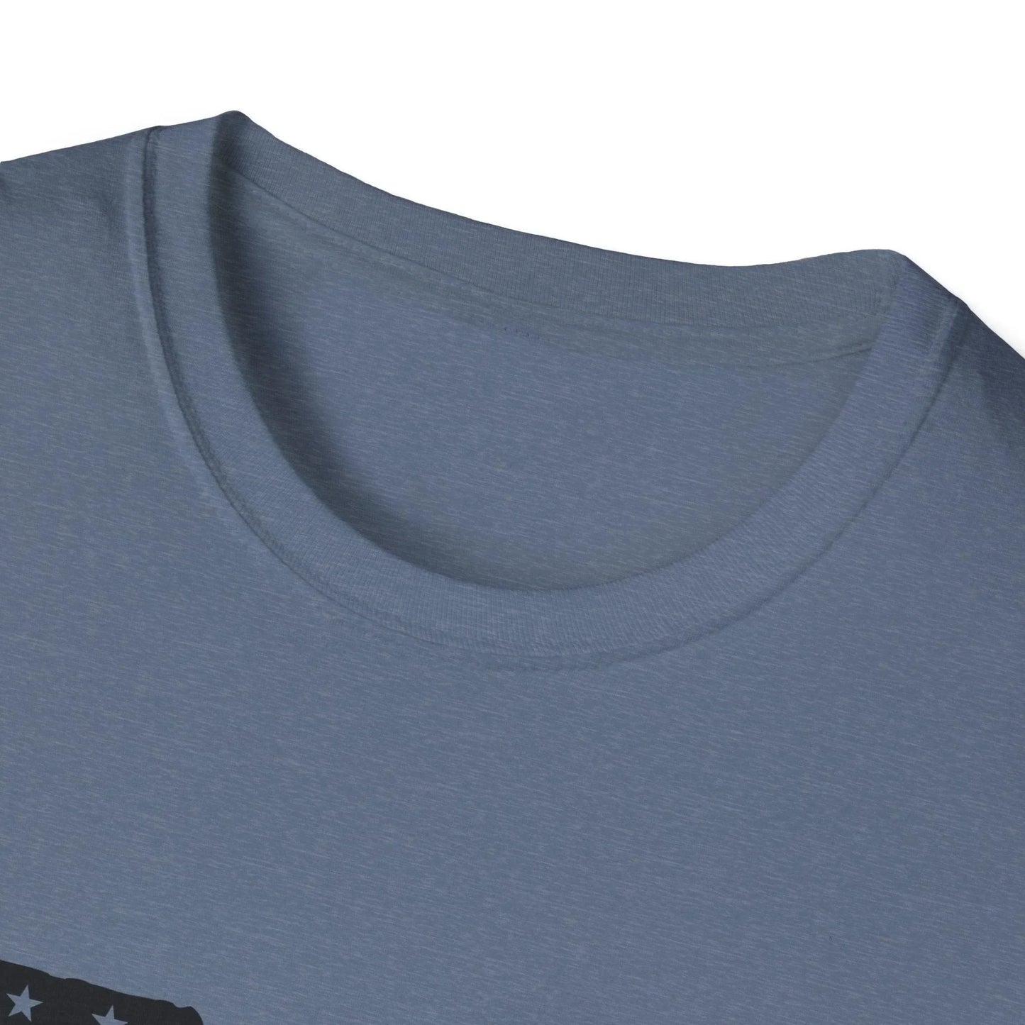 Close-up of the black-and-white American flag graphic on the front chest of the unisex softstyle t-shirt with a crew