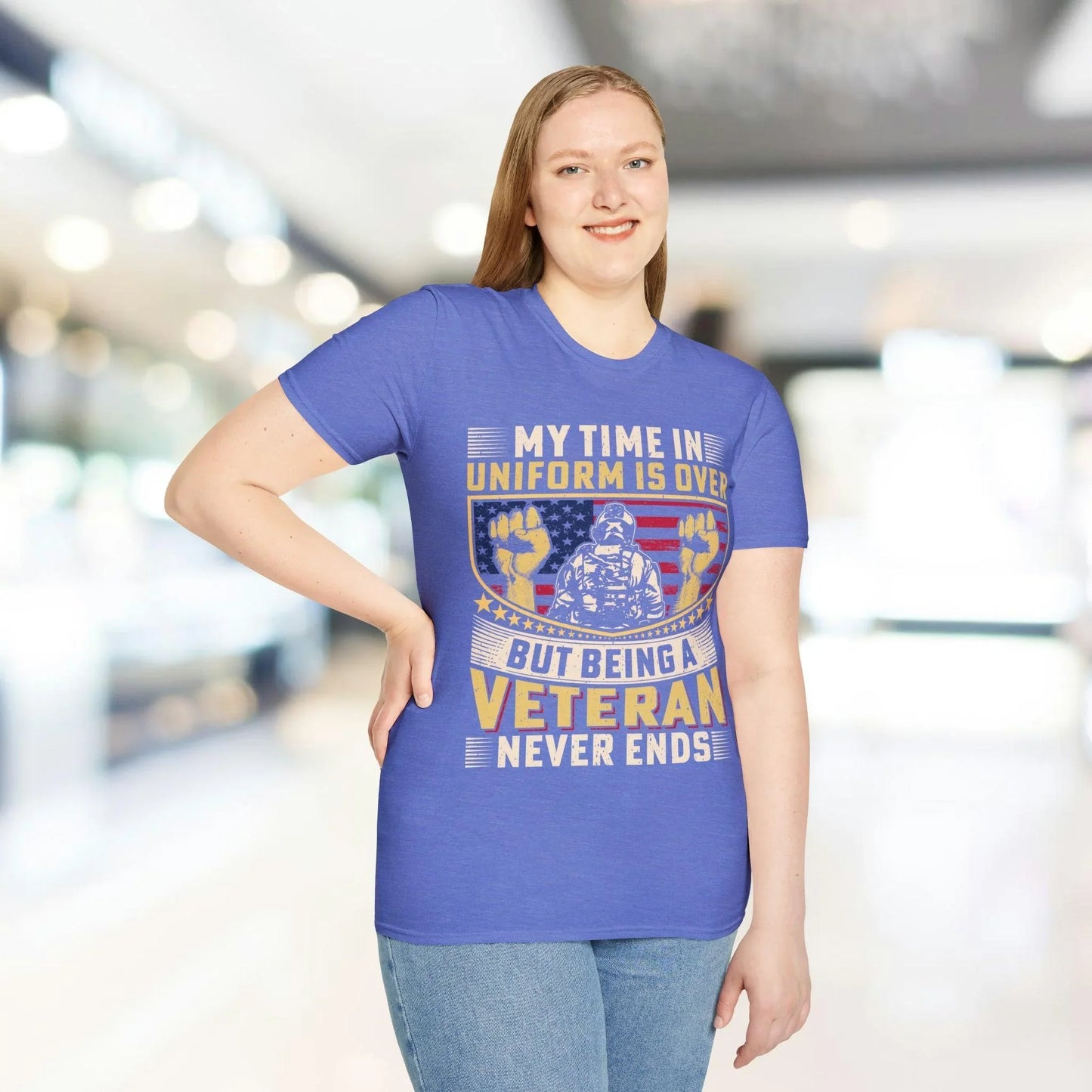 Close-up of the unisex softstyle T-shirt's collar showing relaxed neckline and subtle stitching on navy fabric, highlighting