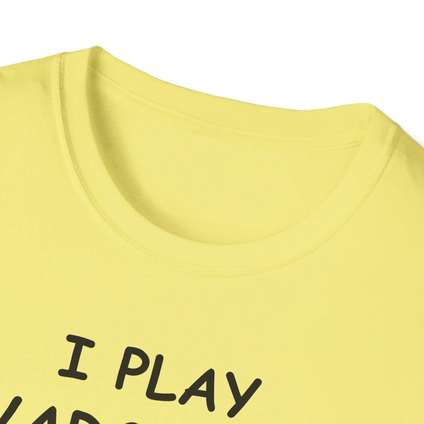 Close-up of the black unisex softstyle T-shirt’s relaxed fit tag sewn at the hem, highlighting the fabric’s smooth cotton