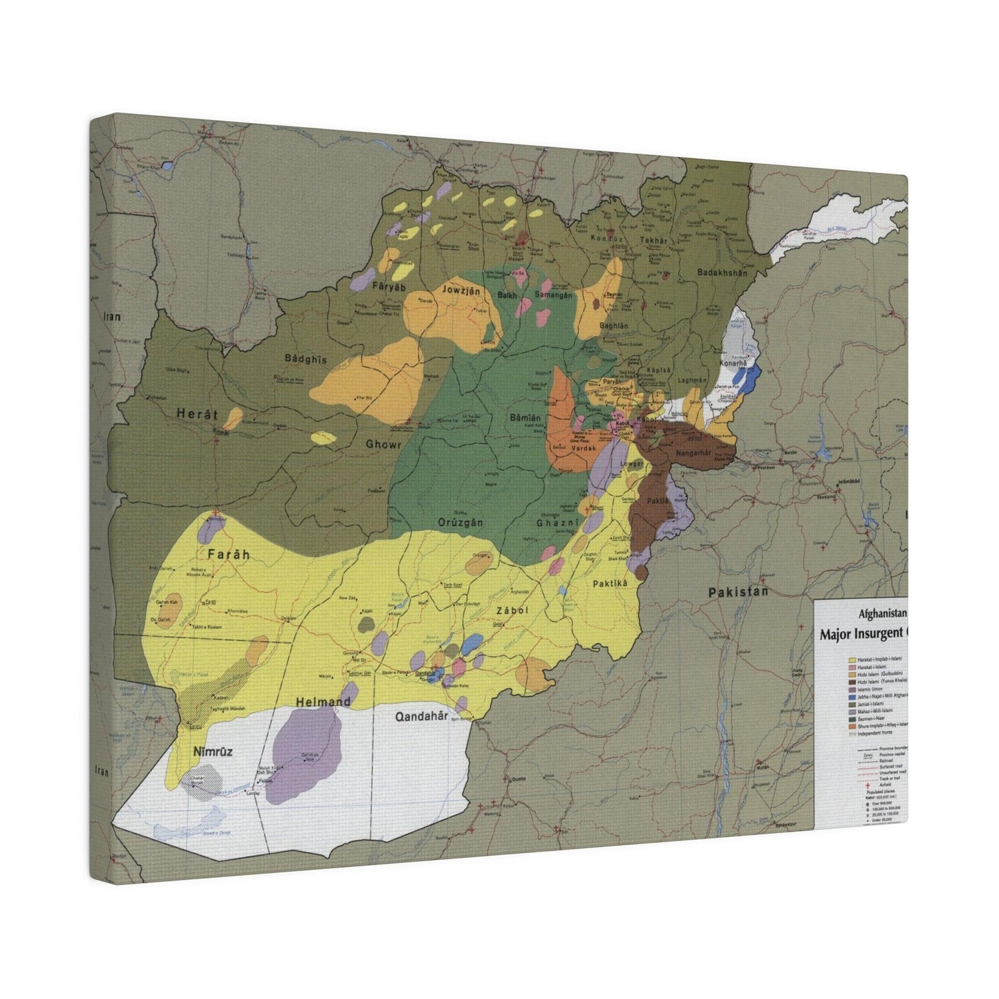 Close-up of detailed map markings and faded text on canvas highlighting insurgent group locations from Afghanistan 1985.