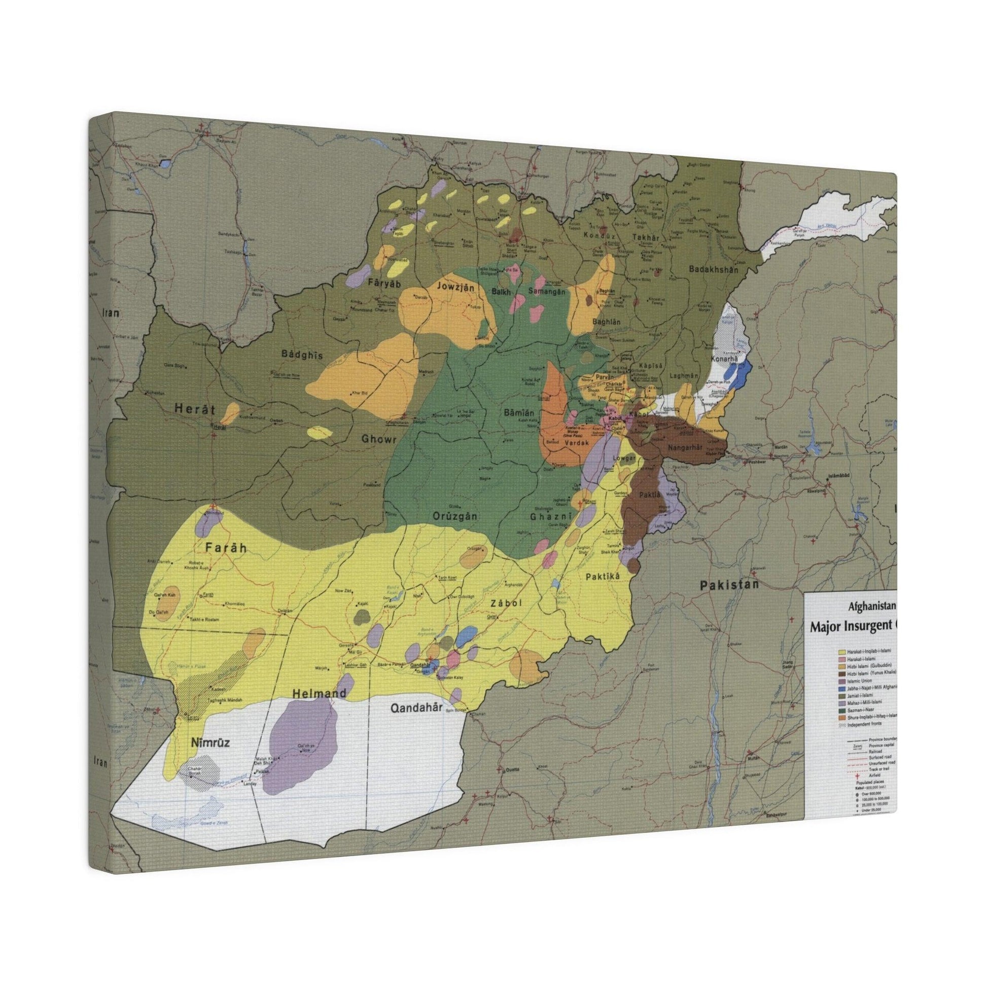 Close-up of detailed map markings and faded text on canvas highlighting insurgent group locations from Afghanistan 1985.