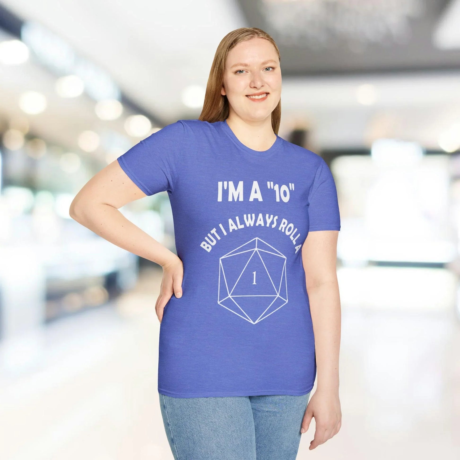 Close-up of the white cotton fabric displaying smooth, soft texture and subtle stitching detail on the unisex T-shirt's