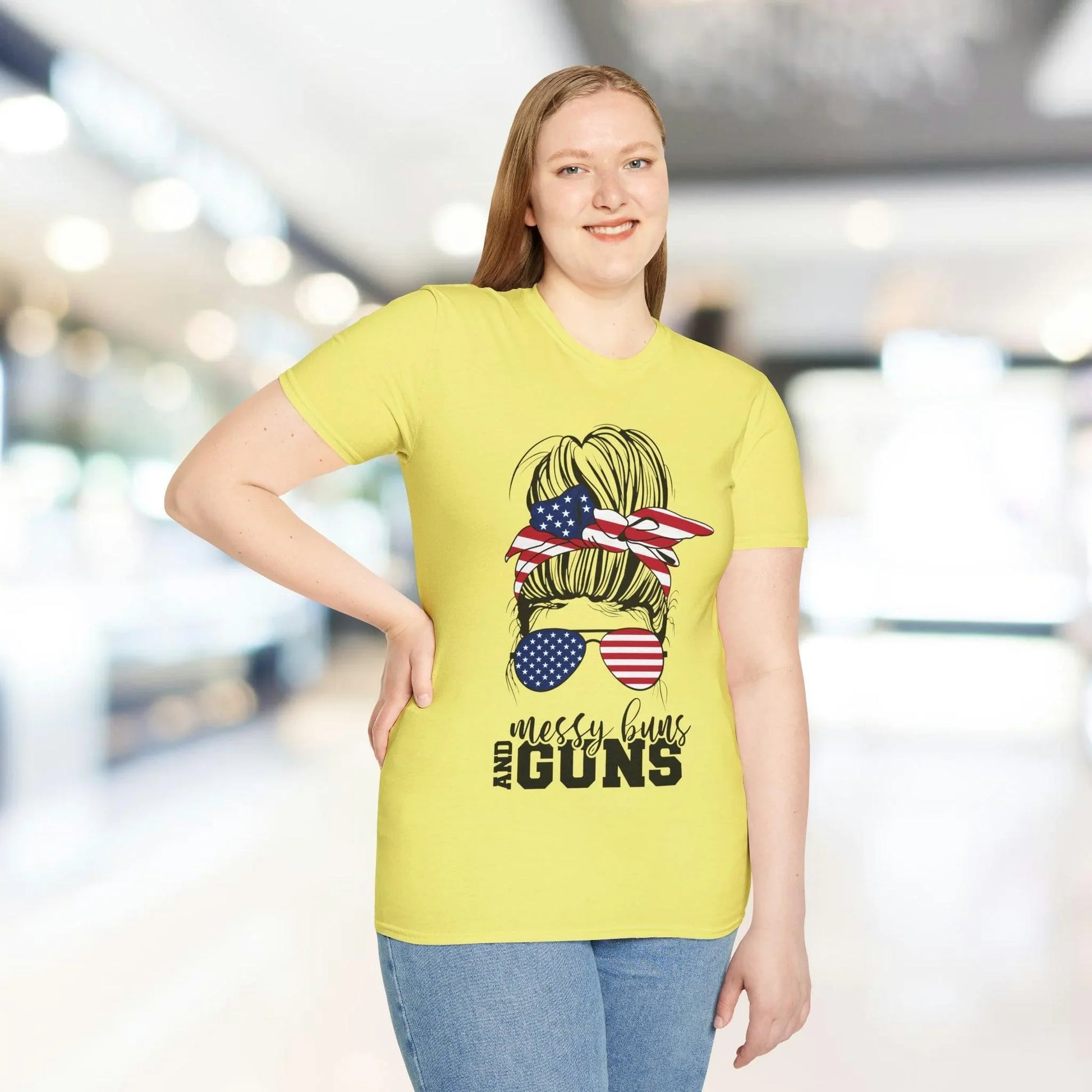 Close-up of the relaxed fit, heather gray fabric showing soft texture and subtle stitching details on the Messy Buns & Guns