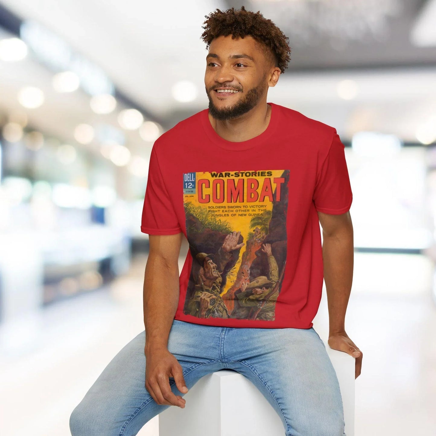 Close-up of the Combat June 1963 T-Shirt label sewn onto the relaxed fit heather gray fabric, highlighting the soft