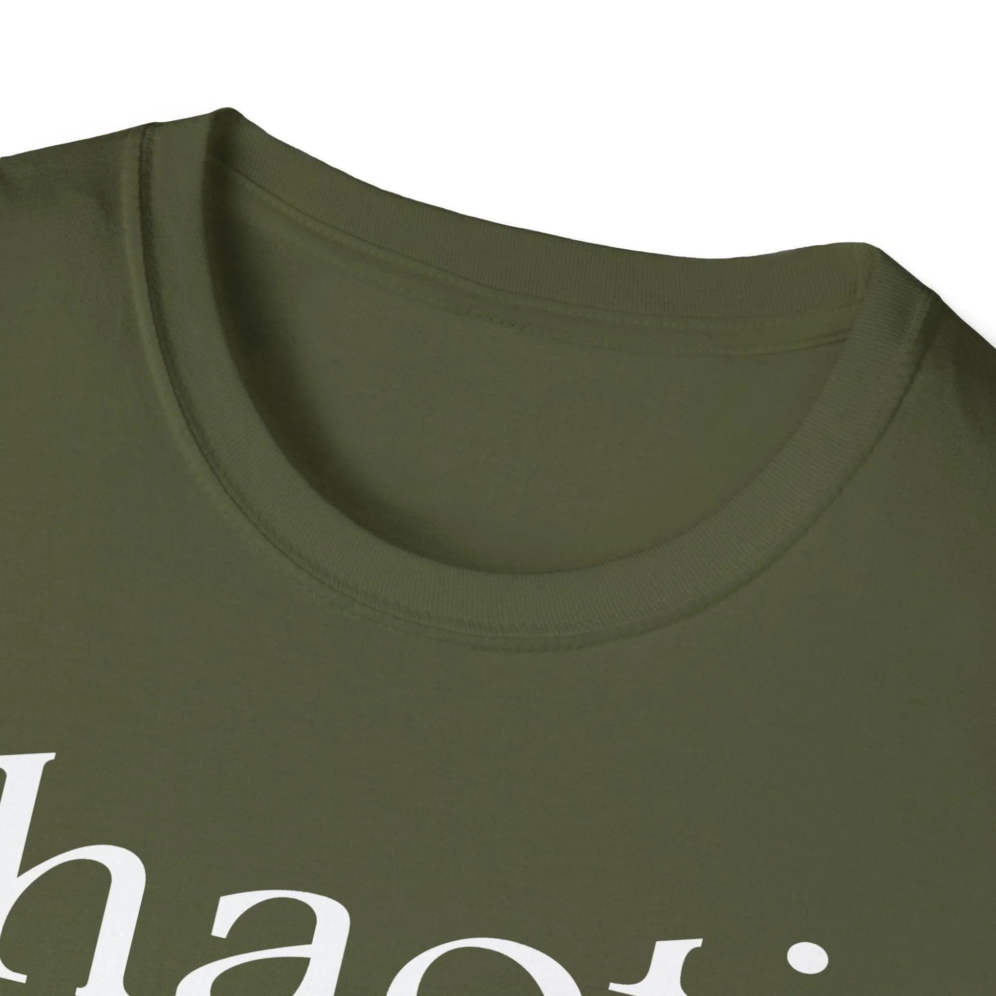 Close-up of the white softstyle fabric displaying smooth texture and subtle stitching along the neckline and sleeve edge.