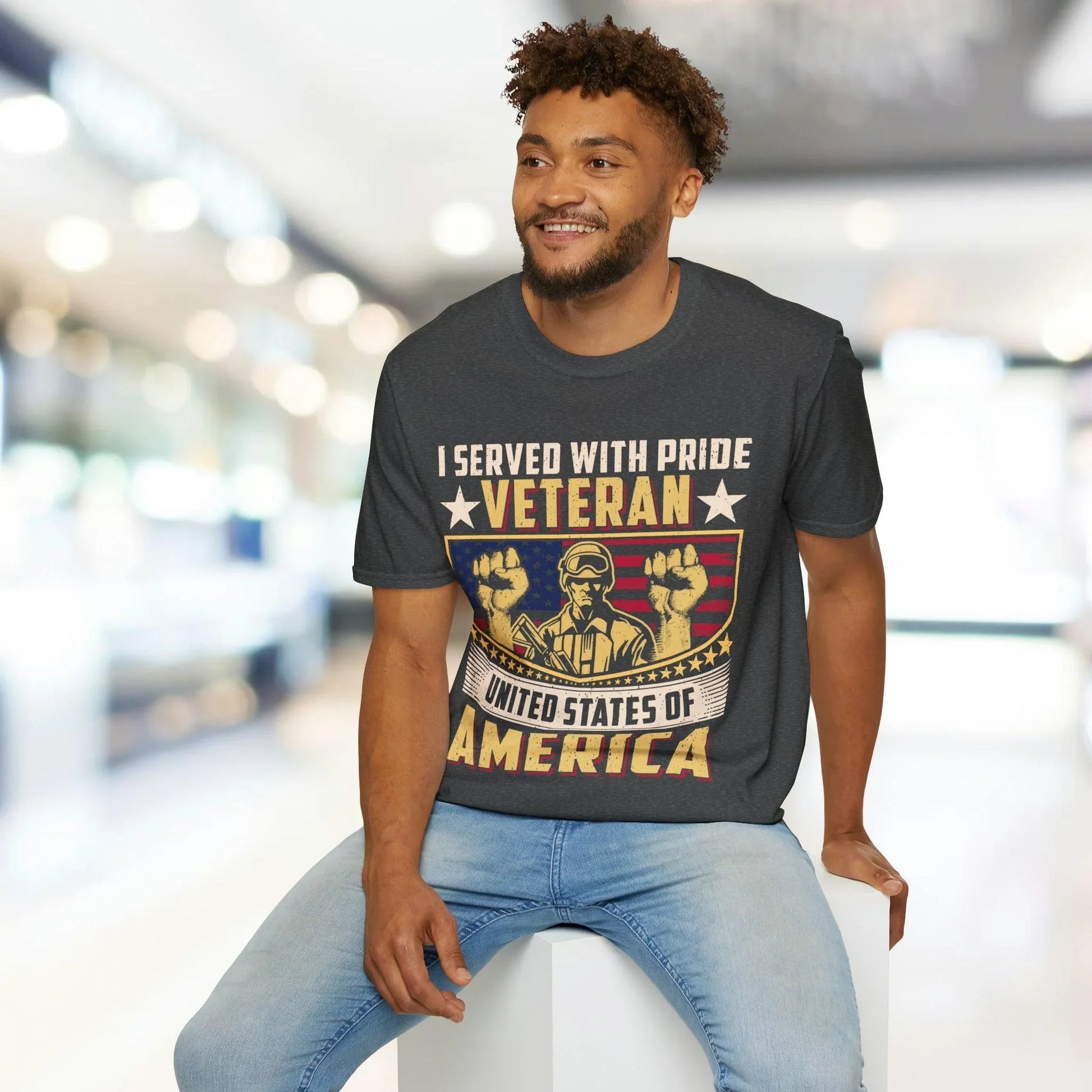 Close-up of the unisex softstyle fabric tag on the hem, highlighting the smooth cotton-polyester blend and relaxed fit in