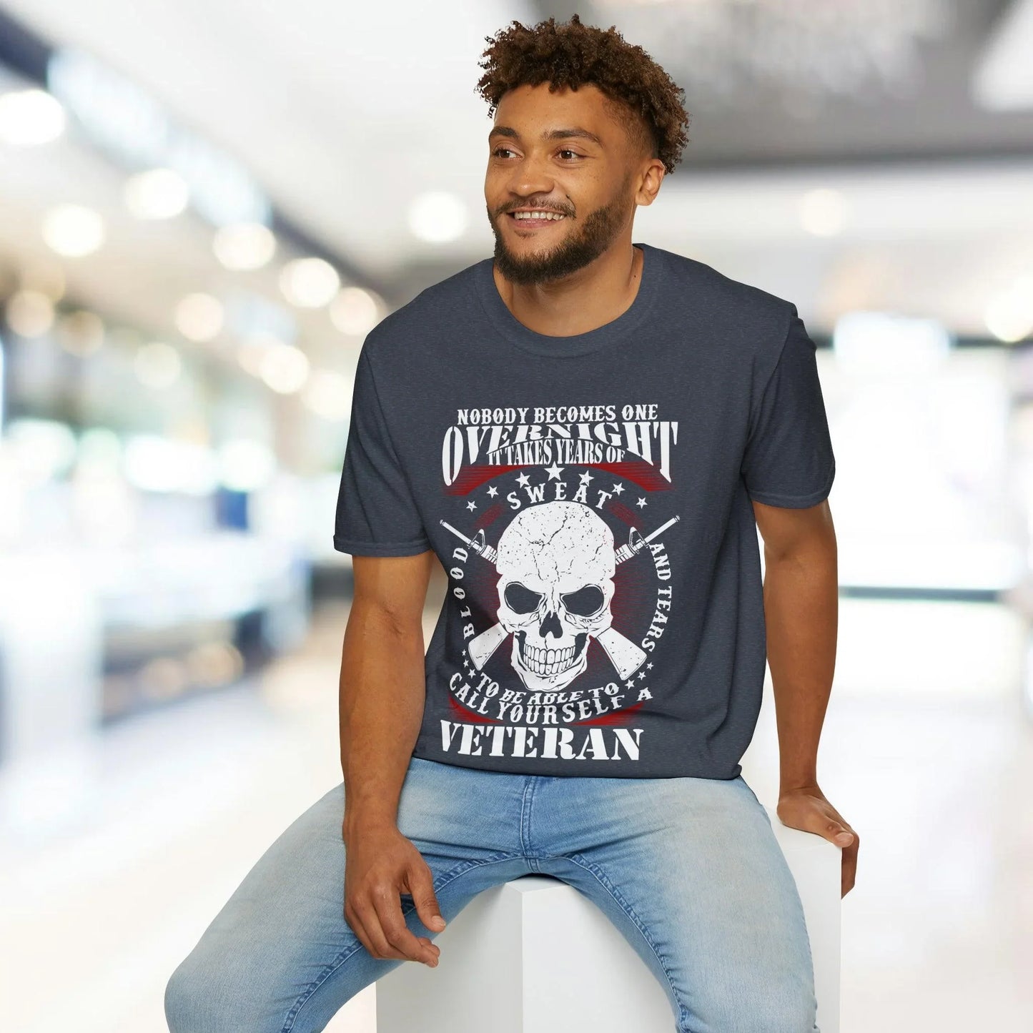 Close-up of the unisex softstyle T-shirt’s crew neckline and smooth fabric texture in heather gray, highlighting relaxed fit