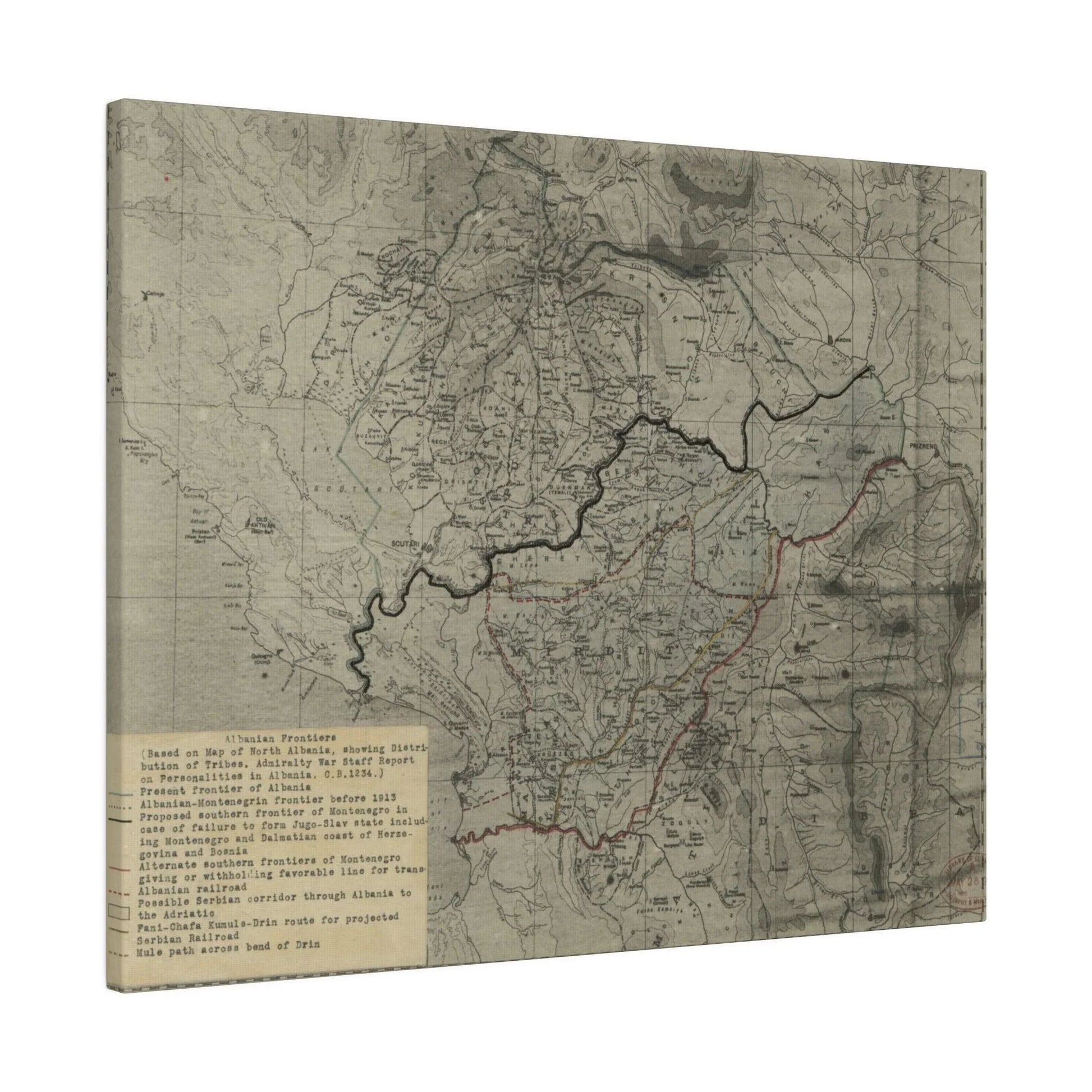 Close-up of textured canvas displaying worn, faded shades of beige and brown, highlighting the vintage surface detail.