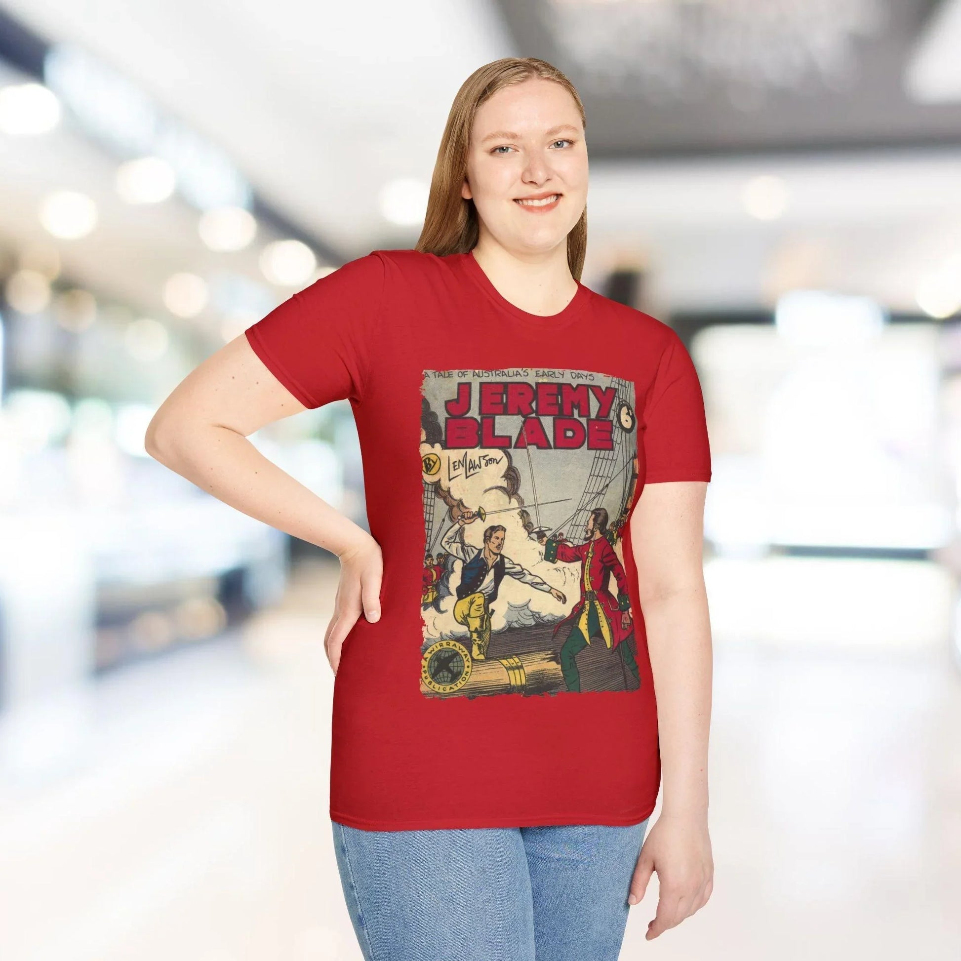 Close-up of Jeremy Blade unisex softstyle T-shirt’s smooth fabric texture and vibrant teal color from a front partial angle.