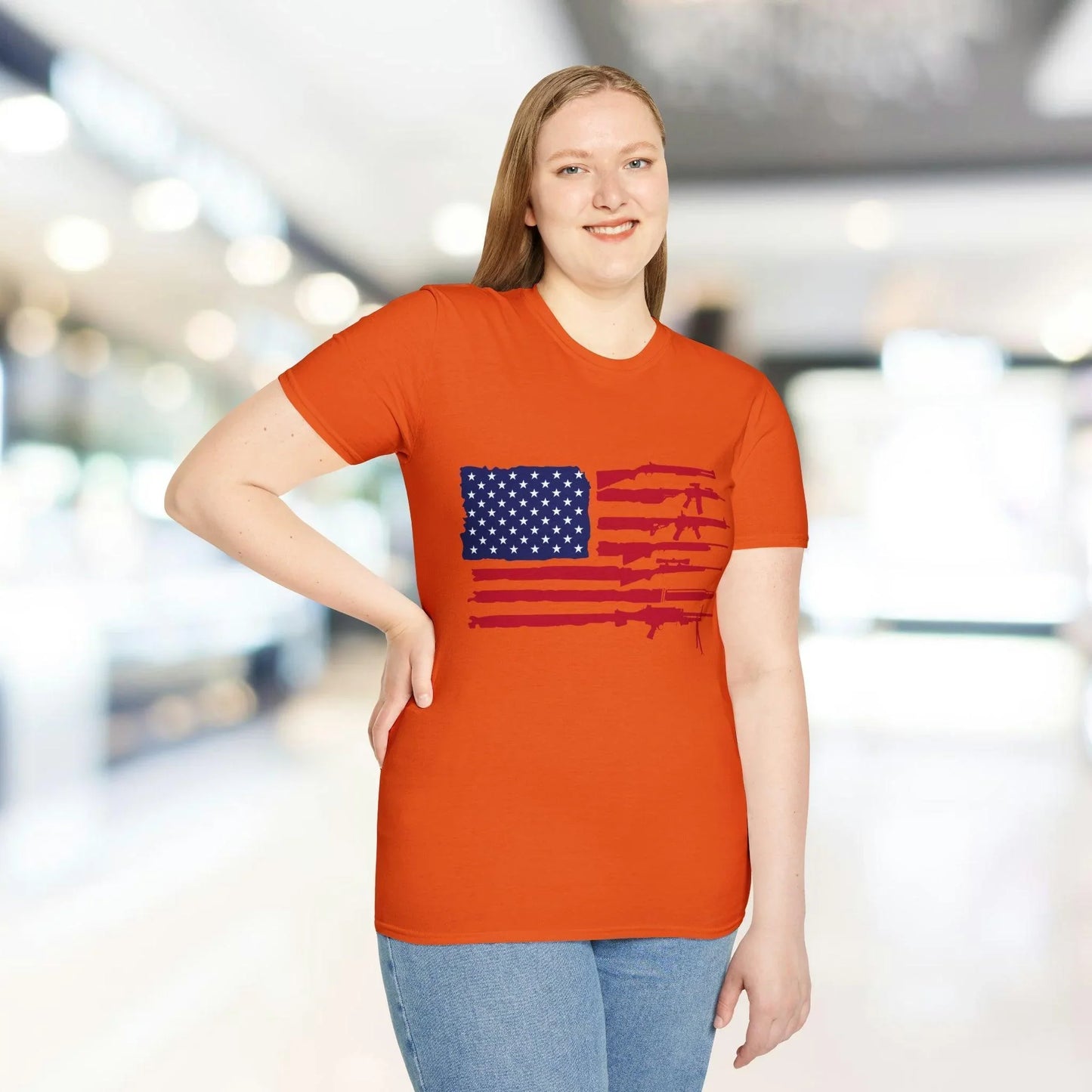 Close-up of the American flag guns design on the chest, showcasing vibrant colors and detailed print on soft slim-fit cotton
