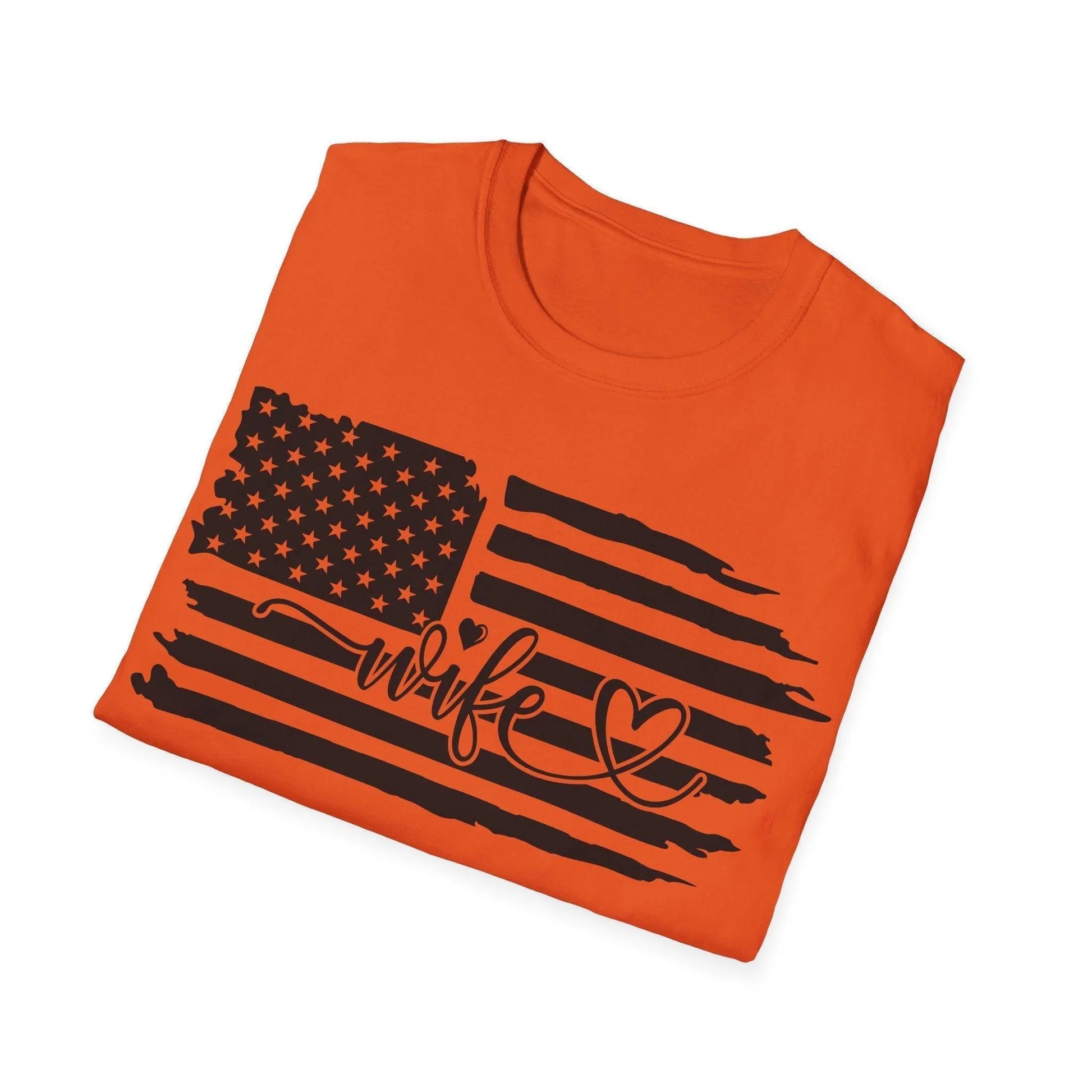 Close-up of distressed American flag printed on black fabric showing fabric weave and subtle faded details on relaxed fit