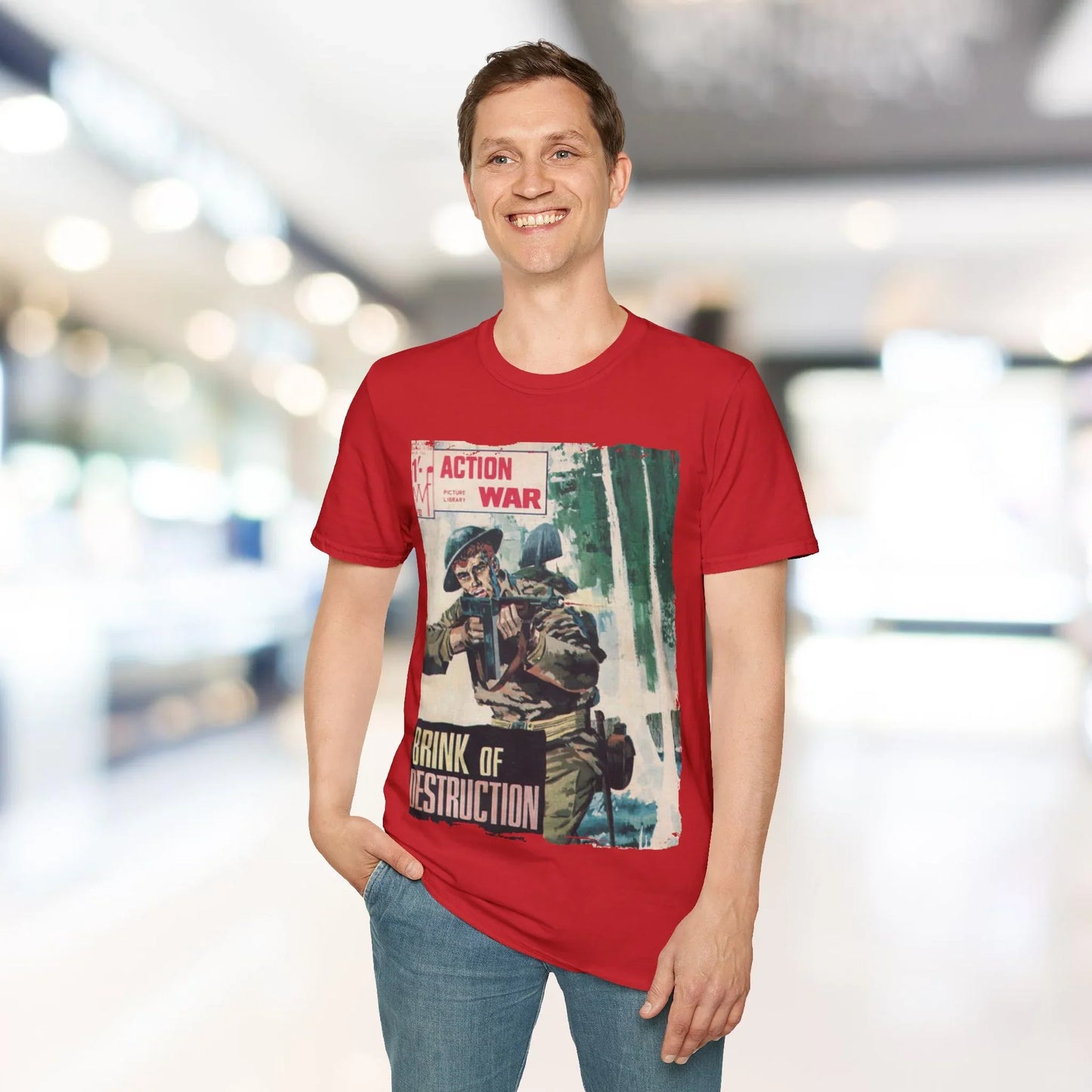 Close-up of the unisex softstyle T-shirt's vibrant red fabric, emphasizing its smooth texture and relaxed fit from a