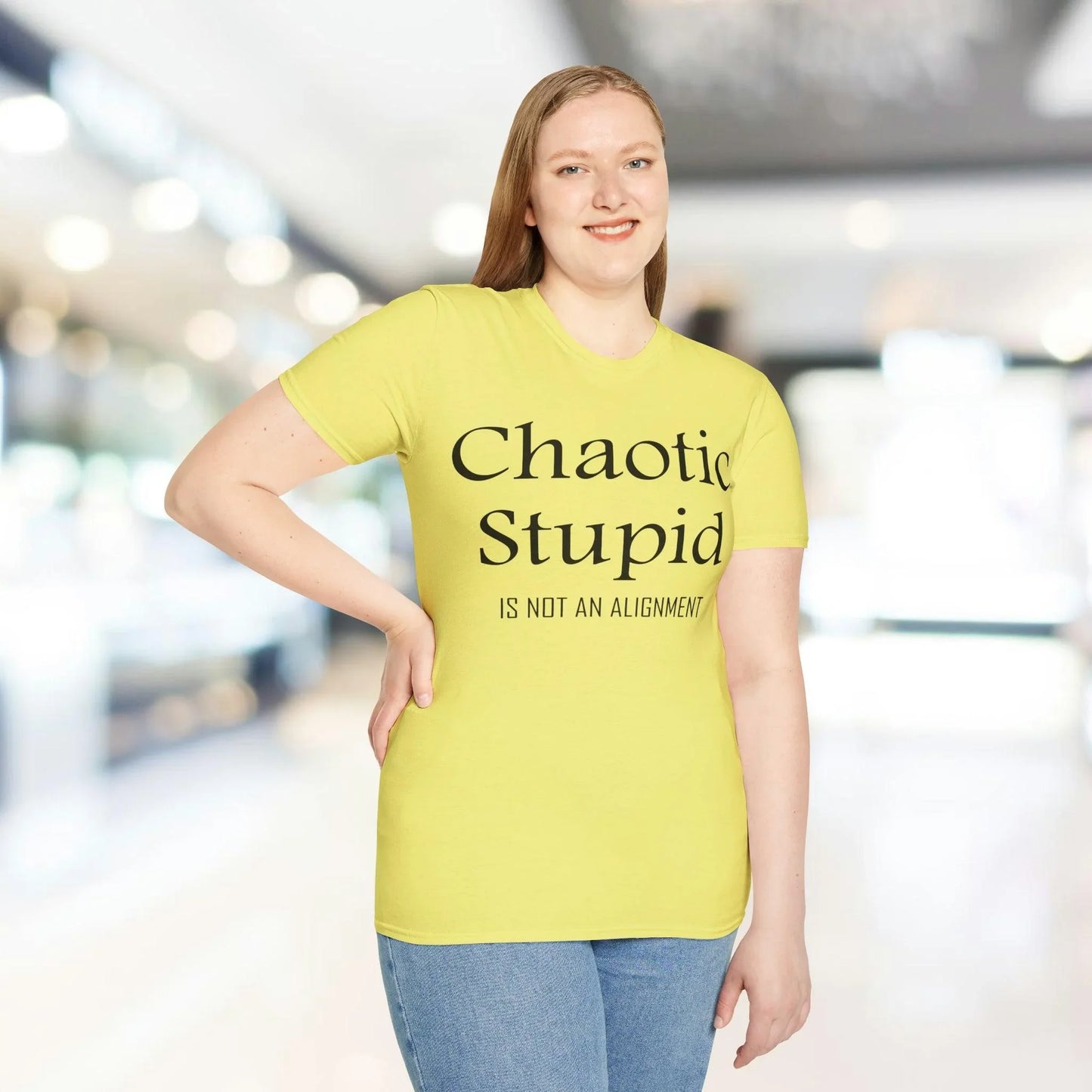 Close-up of black unisex softstyle T-shirt fabric highlighting smooth, tightly woven cotton blend texture and subtle