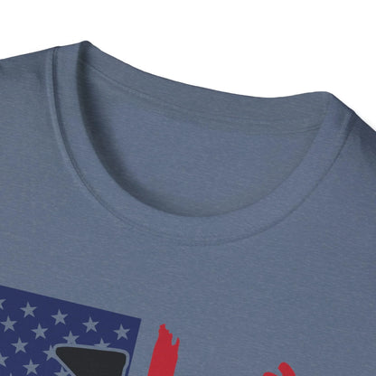 Close-up of the distressed American flag pattern on the unisex softstyle T-shirt’s textured fabric, highlighting the
