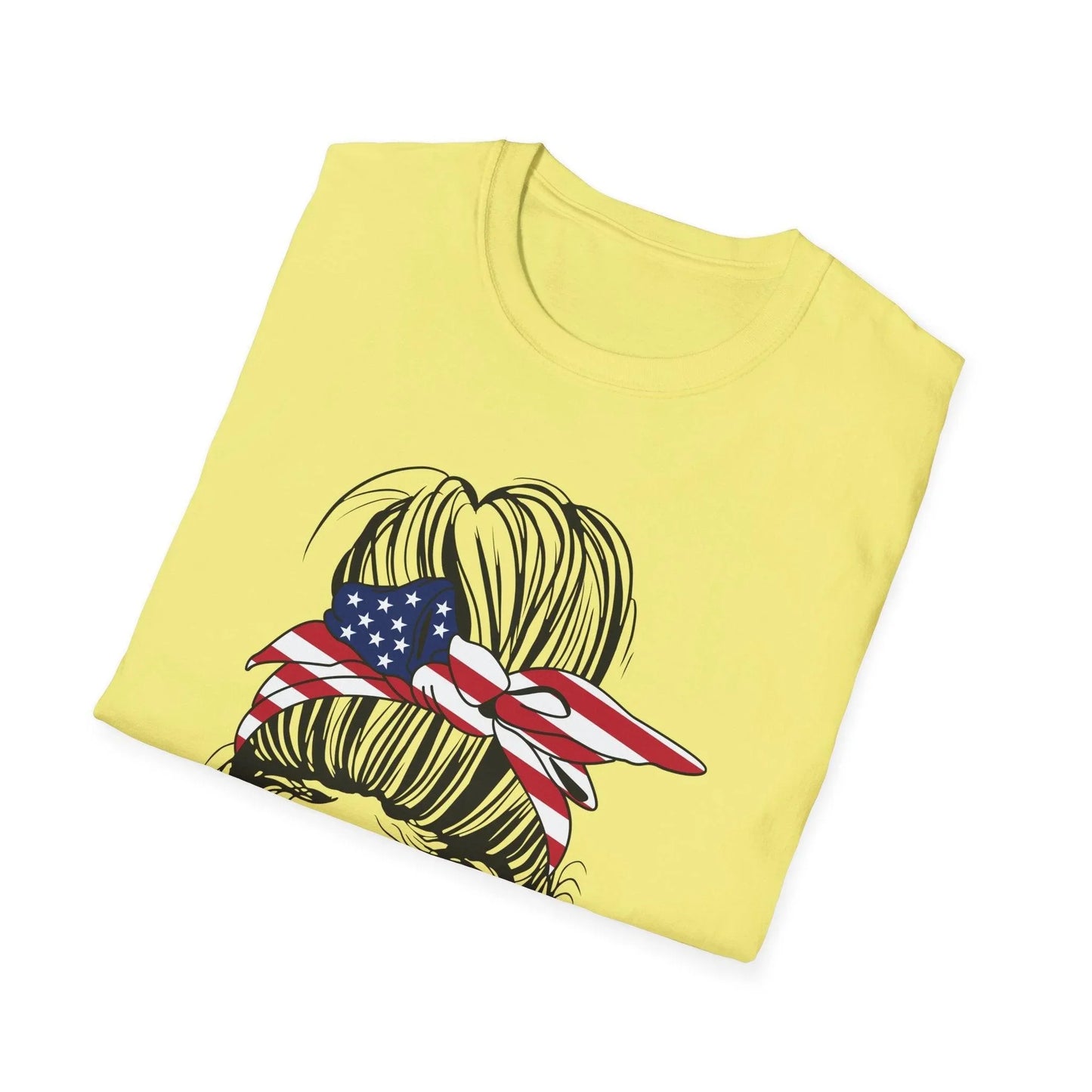 Close-up of the T-shirt's chest pocket featuring the "Messy Buns & Guns" logo on soft cotton fabric with relaxed fit and