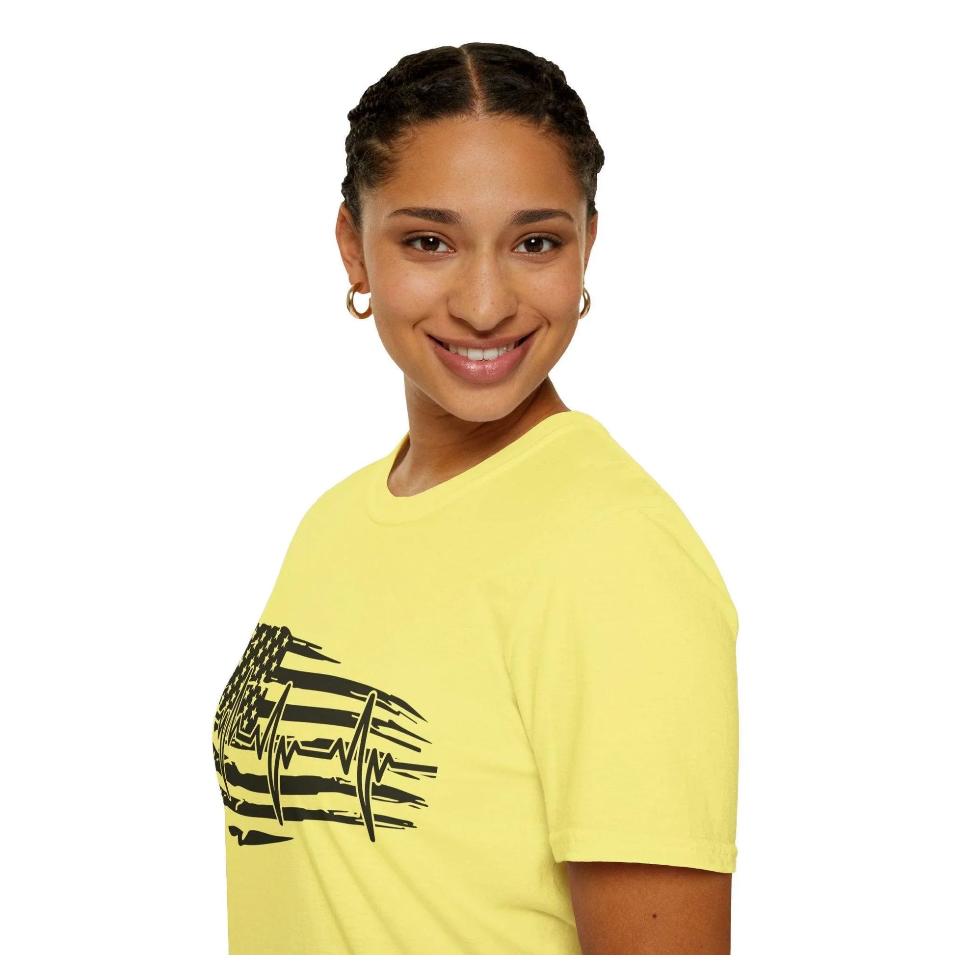 Close-up of black distressed flag heartbeat printed on soft cotton fabric, highlighting textured design and bold monochrome