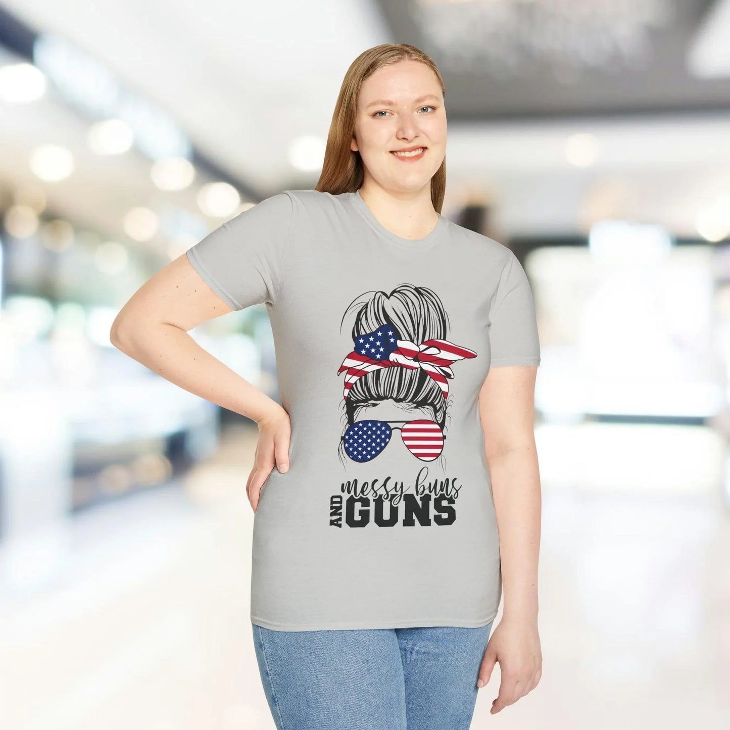 Close-up of the black unisex T-shirt's neckline and sleeve seam highlighting soft cotton fabric and relaxed fit detail.