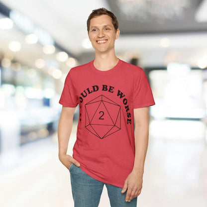 Close-up of the black cotton fabric highlighting the smooth, relaxed fit and subtle texture near the hem of the unisex