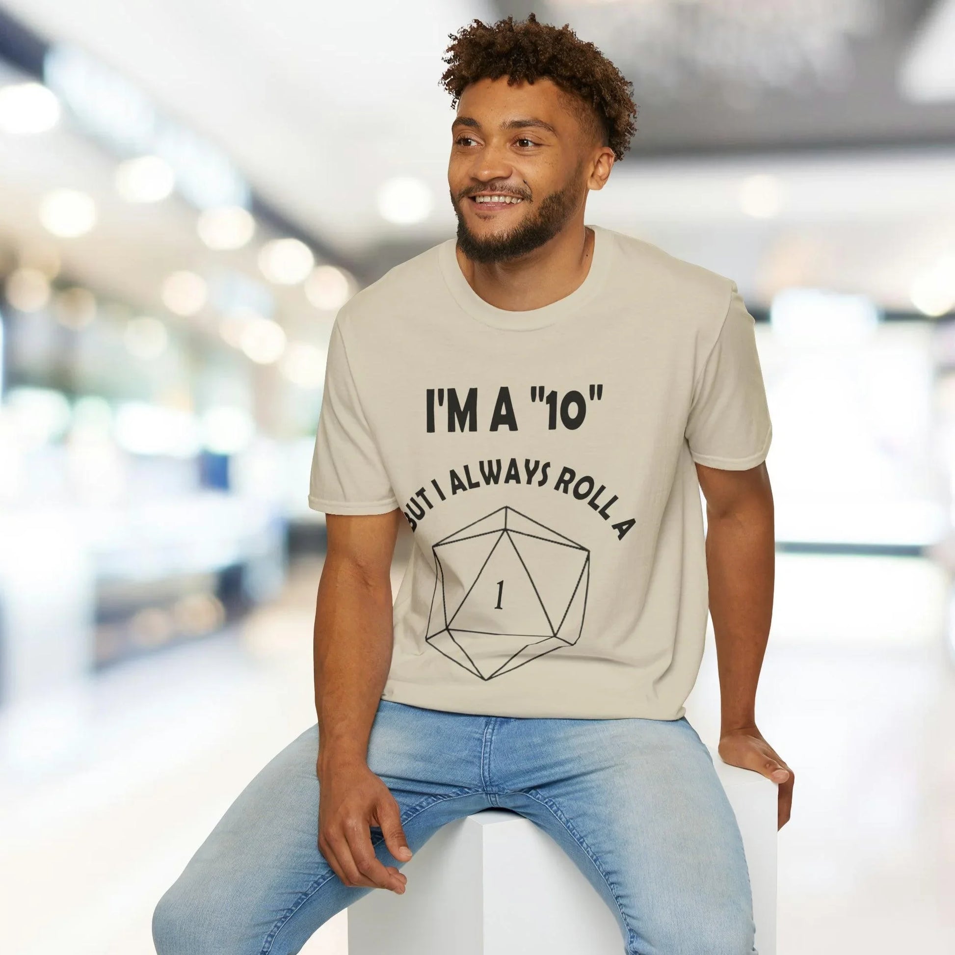 Close-up of the black unisex softstyle cotton T-shirt fabric texture with visible stitching and subtle heather pattern