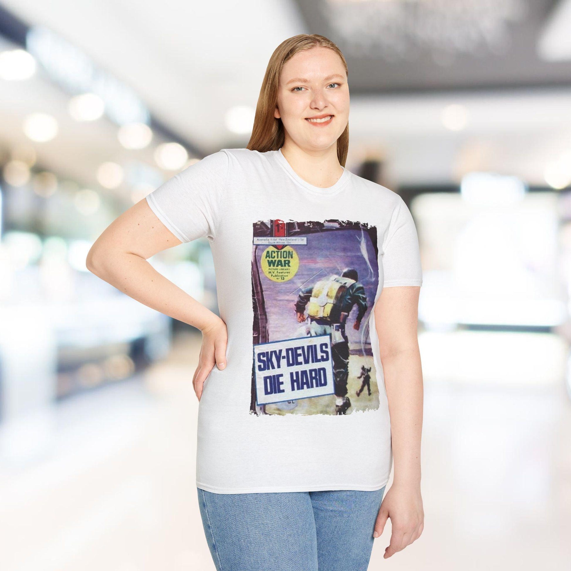 Detail of the unisex relaxed fit T-shirt’s fabric weave in vibrant red, showcasing soft cotton blend construction and smooth