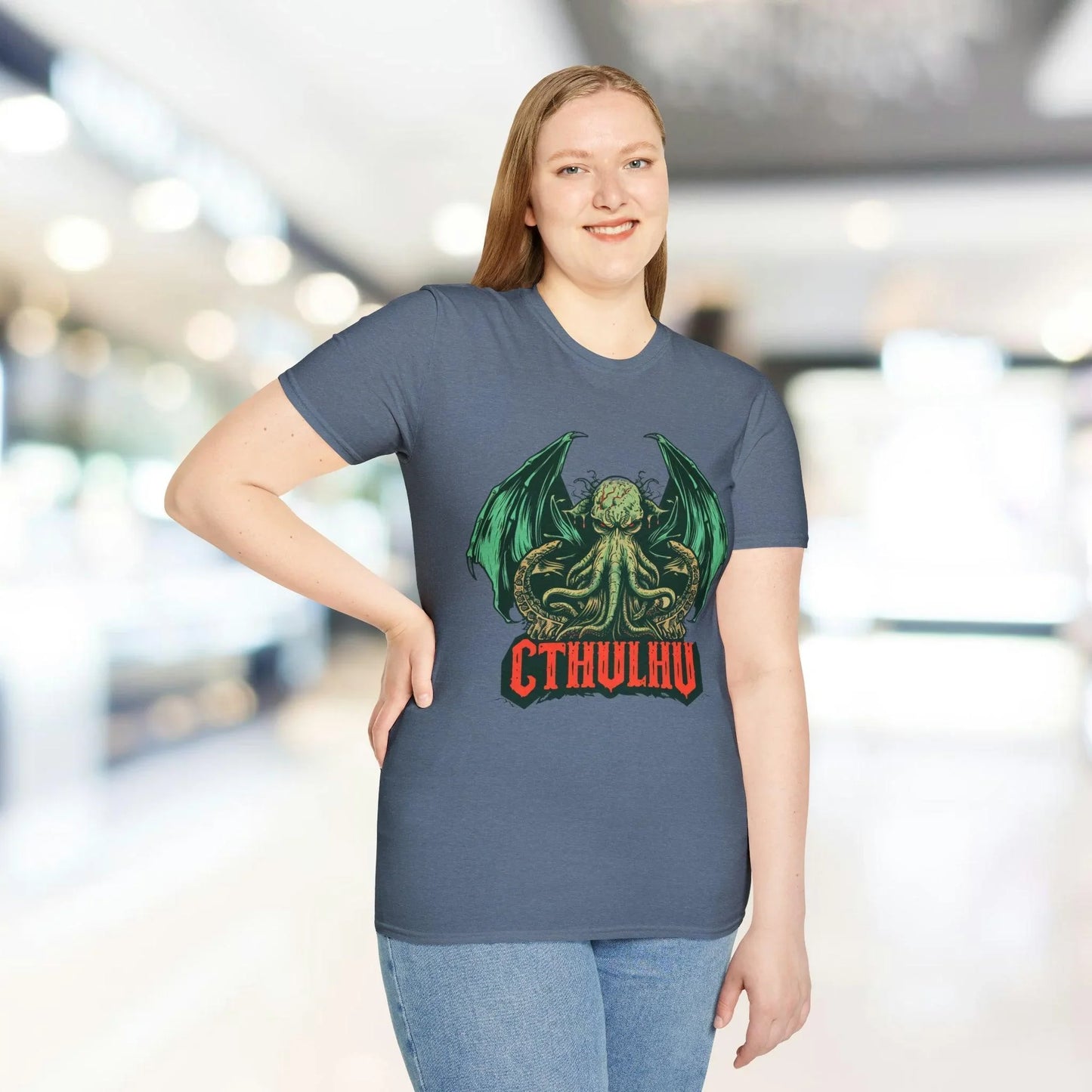 Close-up of the Cthulhu graphics on the chest featuring detailed linework and vibrant teal accents on the relaxed-fit black