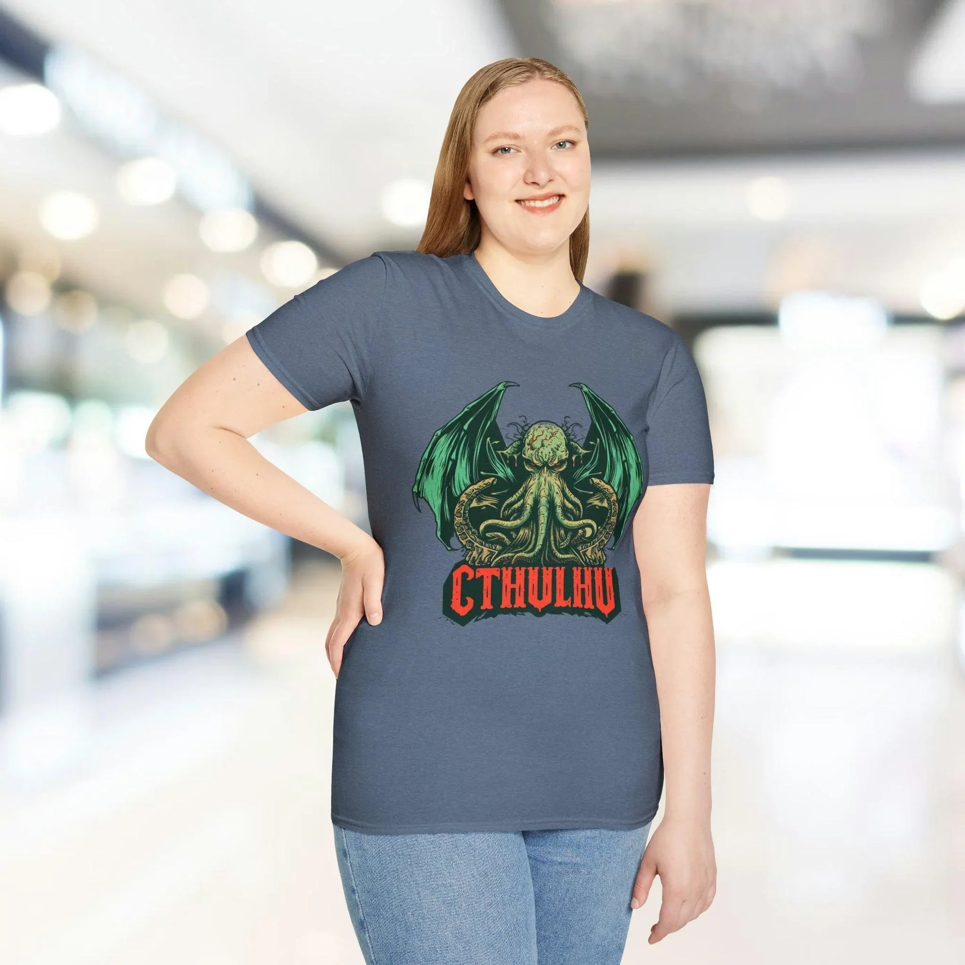 Close-up of the Cthulhu graphics on the chest featuring detailed linework and vibrant teal accents on the relaxed-fit black