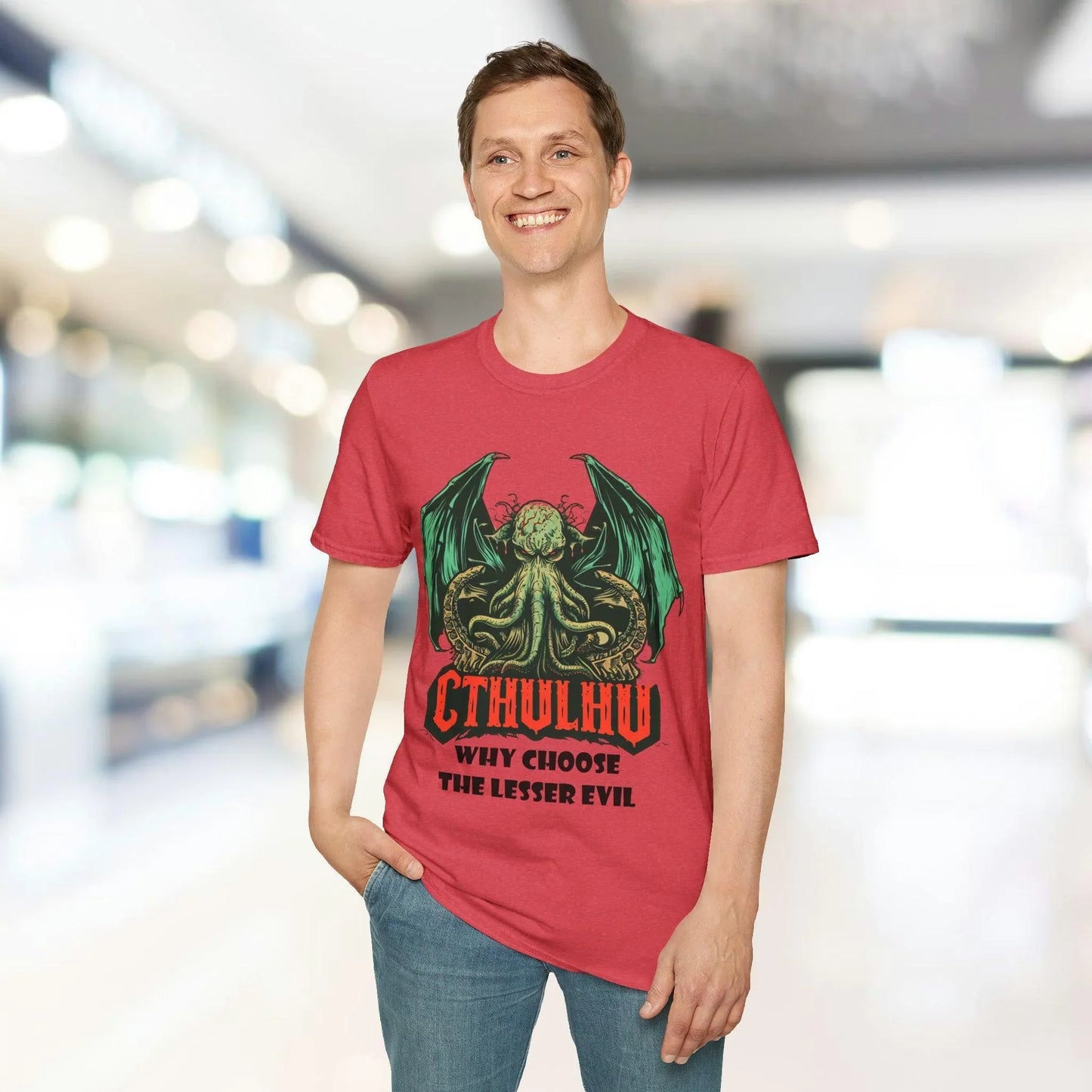 Close-up of Cthulhu graphic detail on forest green unisex softstyle T-shirt fabric with visible stitching at neckline